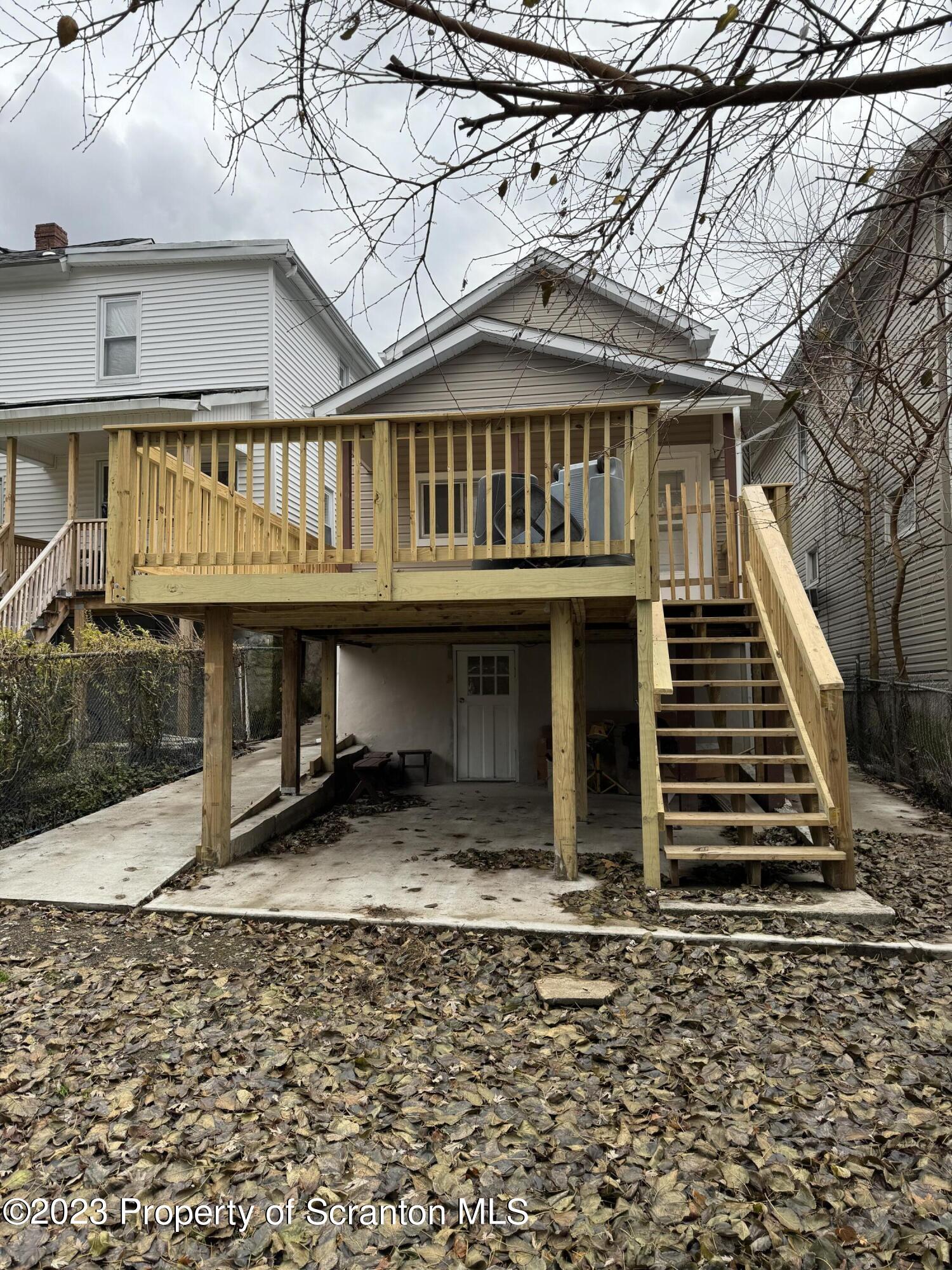 318 1/2 14th Avenue Scranton, PA 18504 - Photo 2 of 10 a front view of a house with a balcony