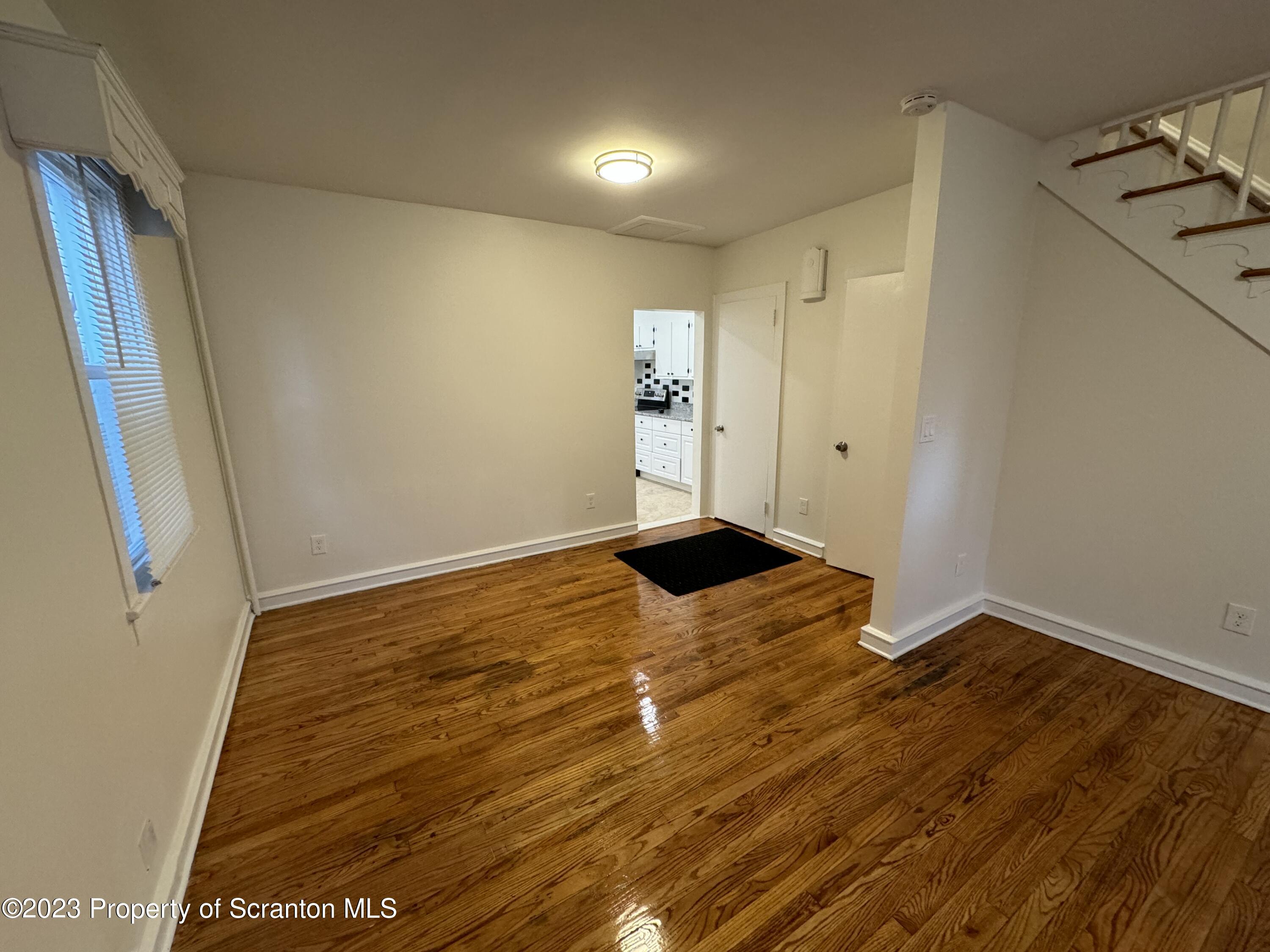 318 1/2 14th Avenue Scranton, PA 18504 - Photo 3 of 10 a view of empty room with wooden floor