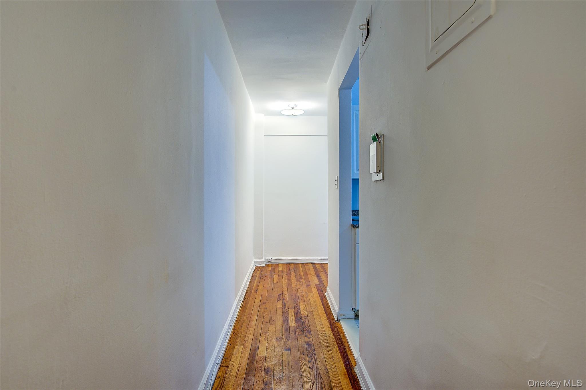 67-12 Yellowstone Boulevard, Unit D9 Queens, NY 11375 - Photo 14 of 36 a view of a bathroom with a bathtub
