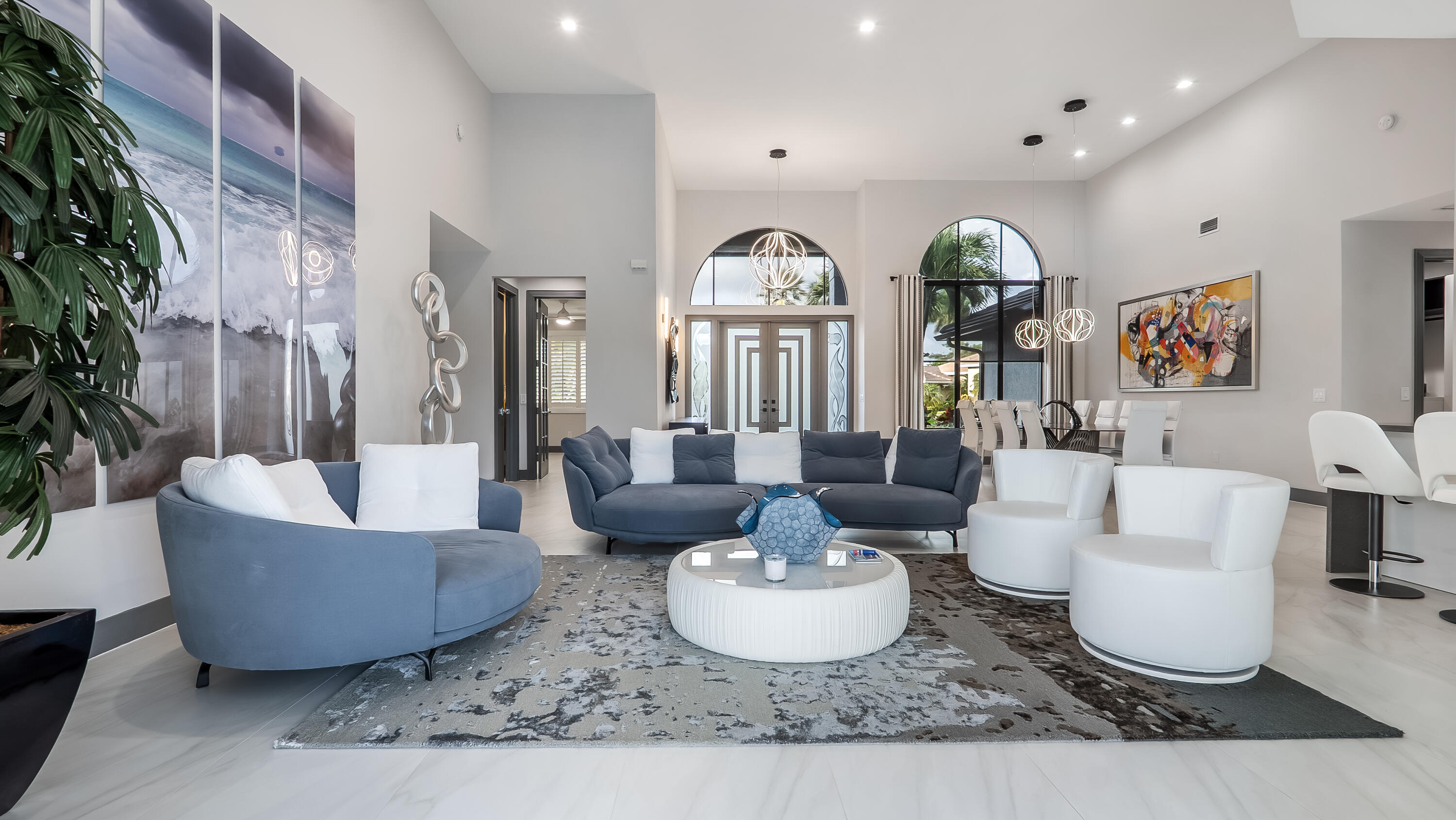 17683 Sealakes Drive Boca Raton, FL 33498 - Photo 11 of 61 a living room with furniture and a potted plant