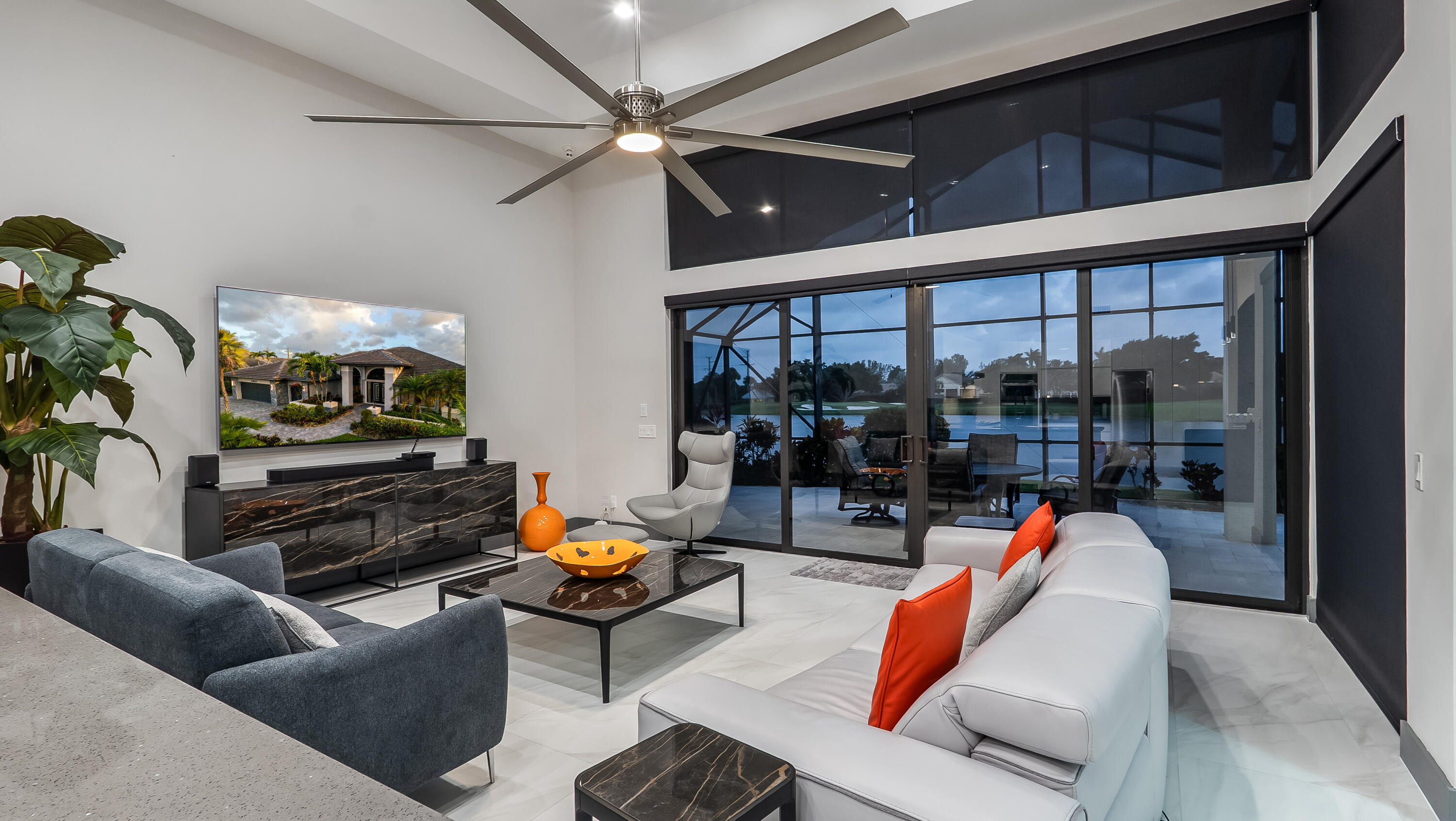 17683 Sealakes Drive Boca Raton, FL 33498 - Photo 16 of 61 a outdoor living space with furniture and a fireplace