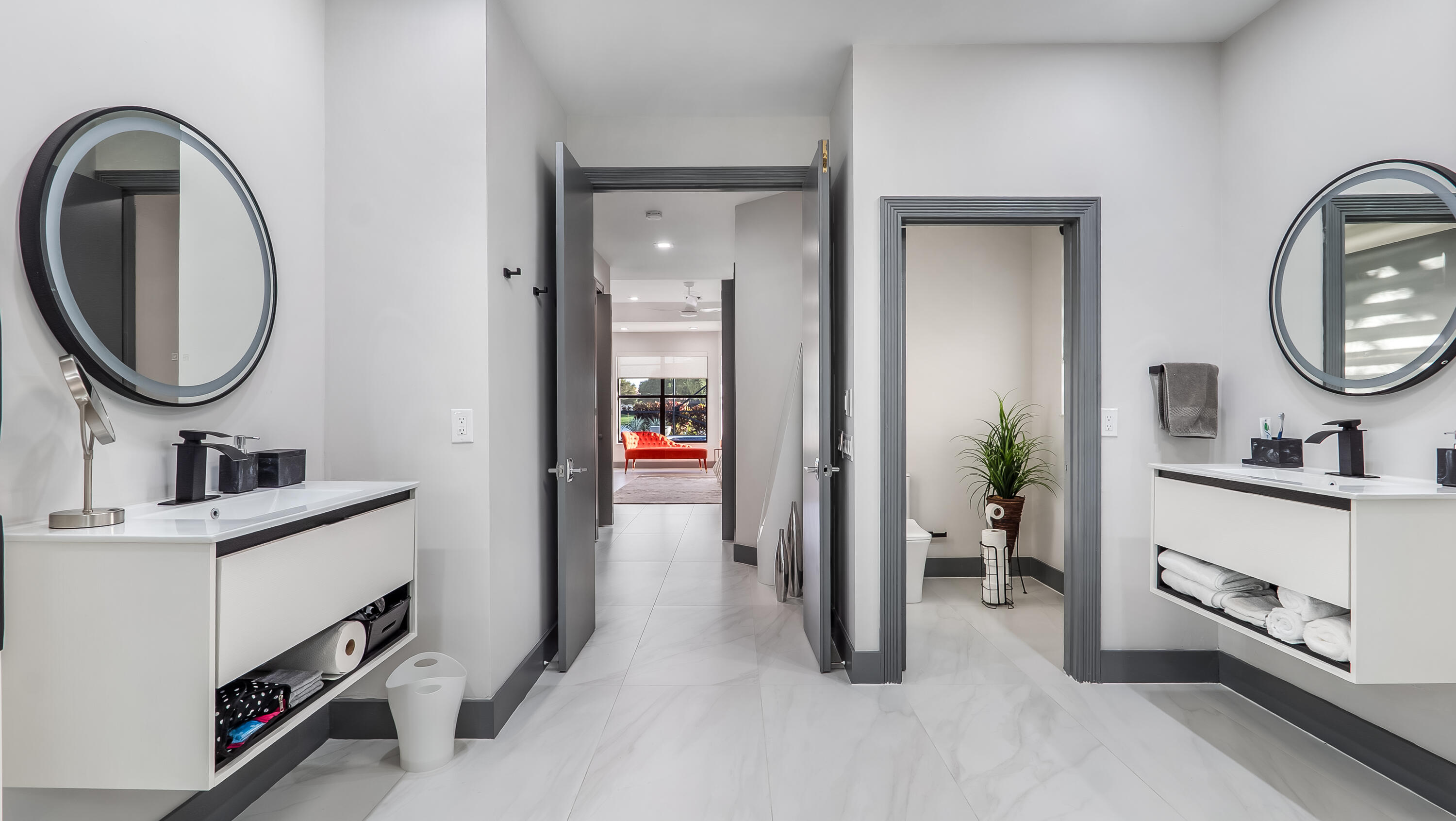 17683 Sealakes Drive Boca Raton, FL 33498 - Photo 34 of 61 a view of a hallway with workspace and a mirror