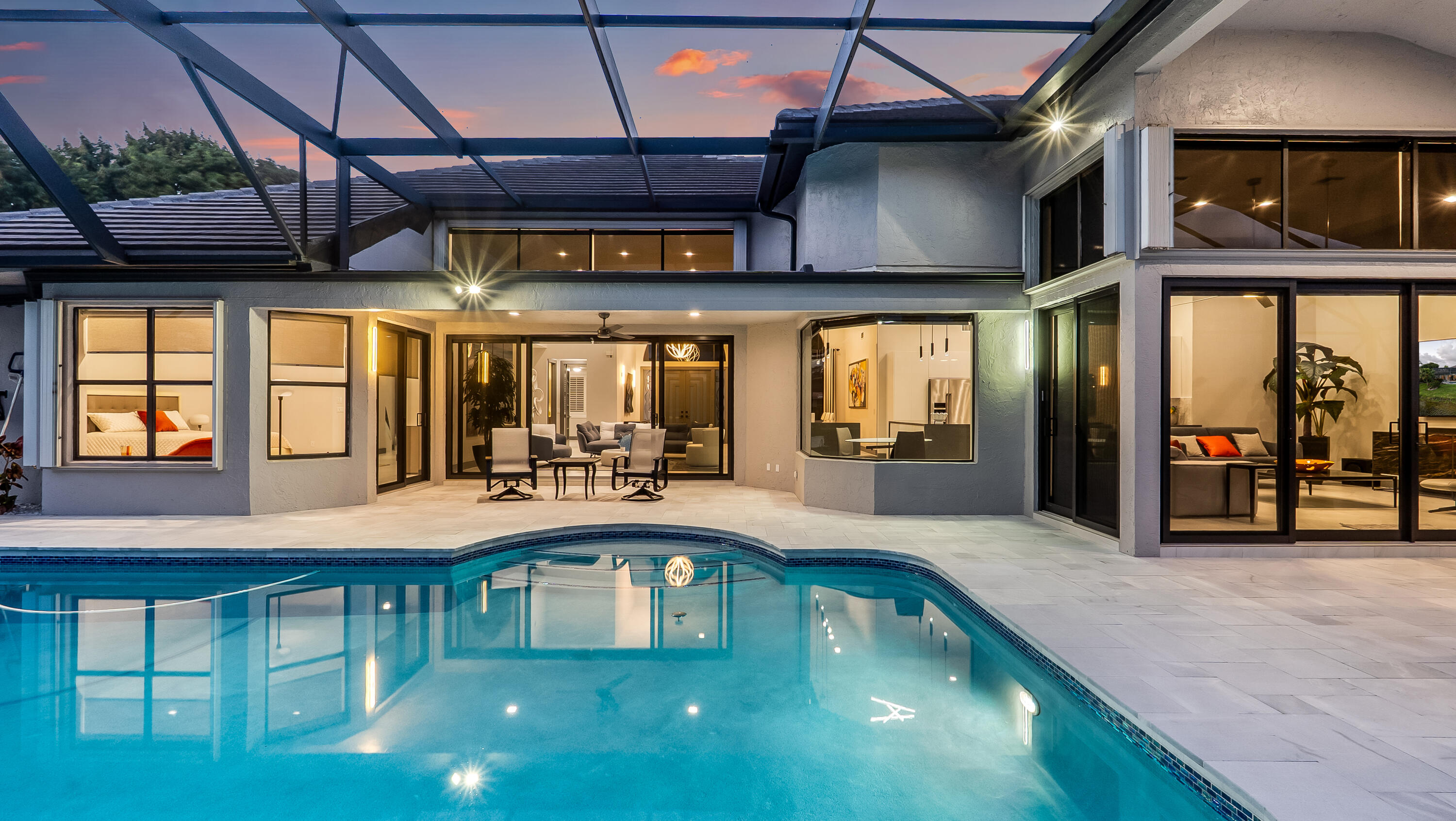 17683 Sealakes Drive Boca Raton, FL 33498 - Photo 47 of 61 a view of a swimming pool with a outdoor seating
