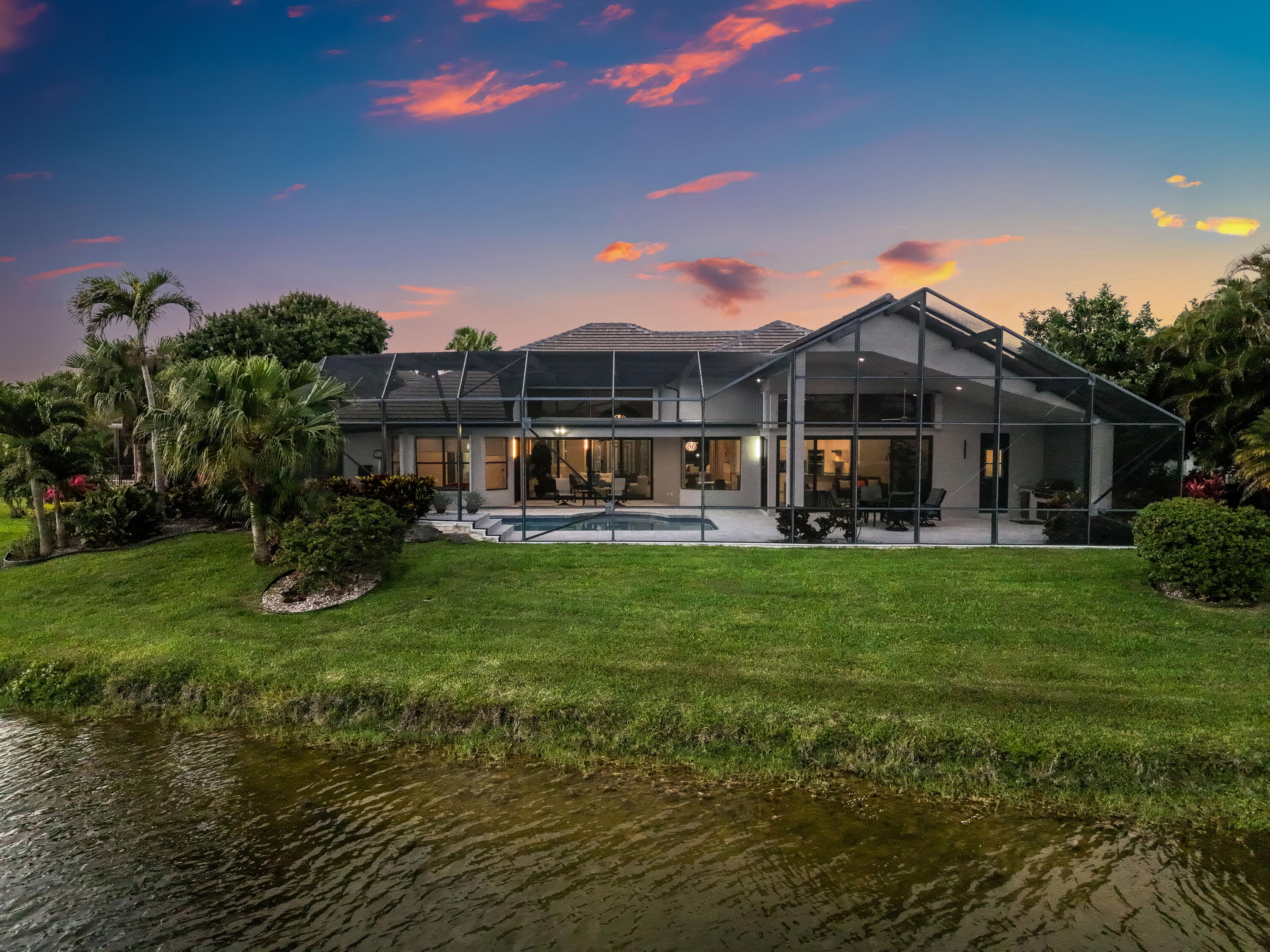 17683 Sealakes Drive Boca Raton, FL 33498 - Photo 52 of 61 a view of a house with a backyard porch and sitting area