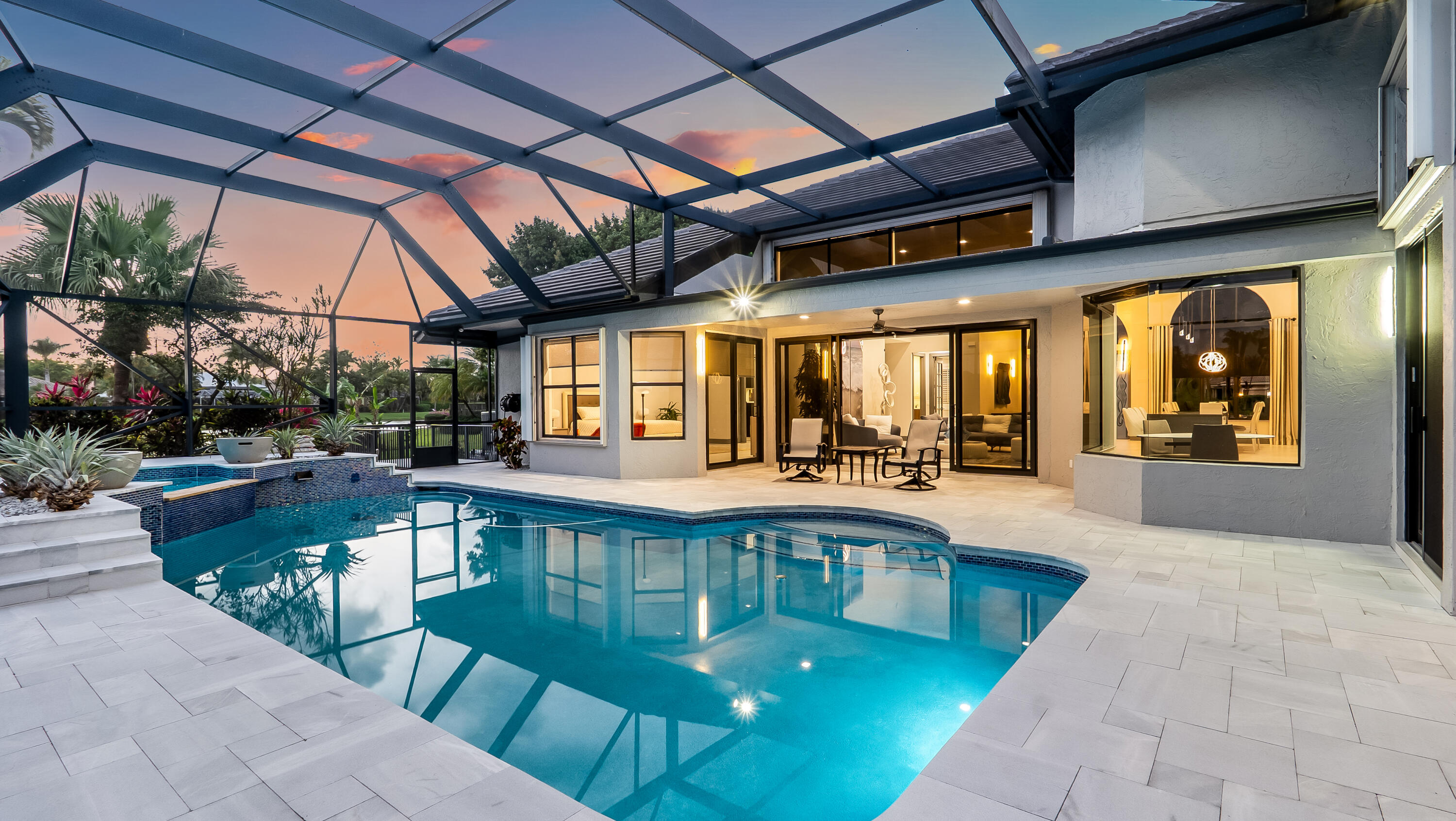 17683 Sealakes Drive Boca Raton, FL 33498 - Photo 53 of 61 a view of a swimming pool with outdoor seating