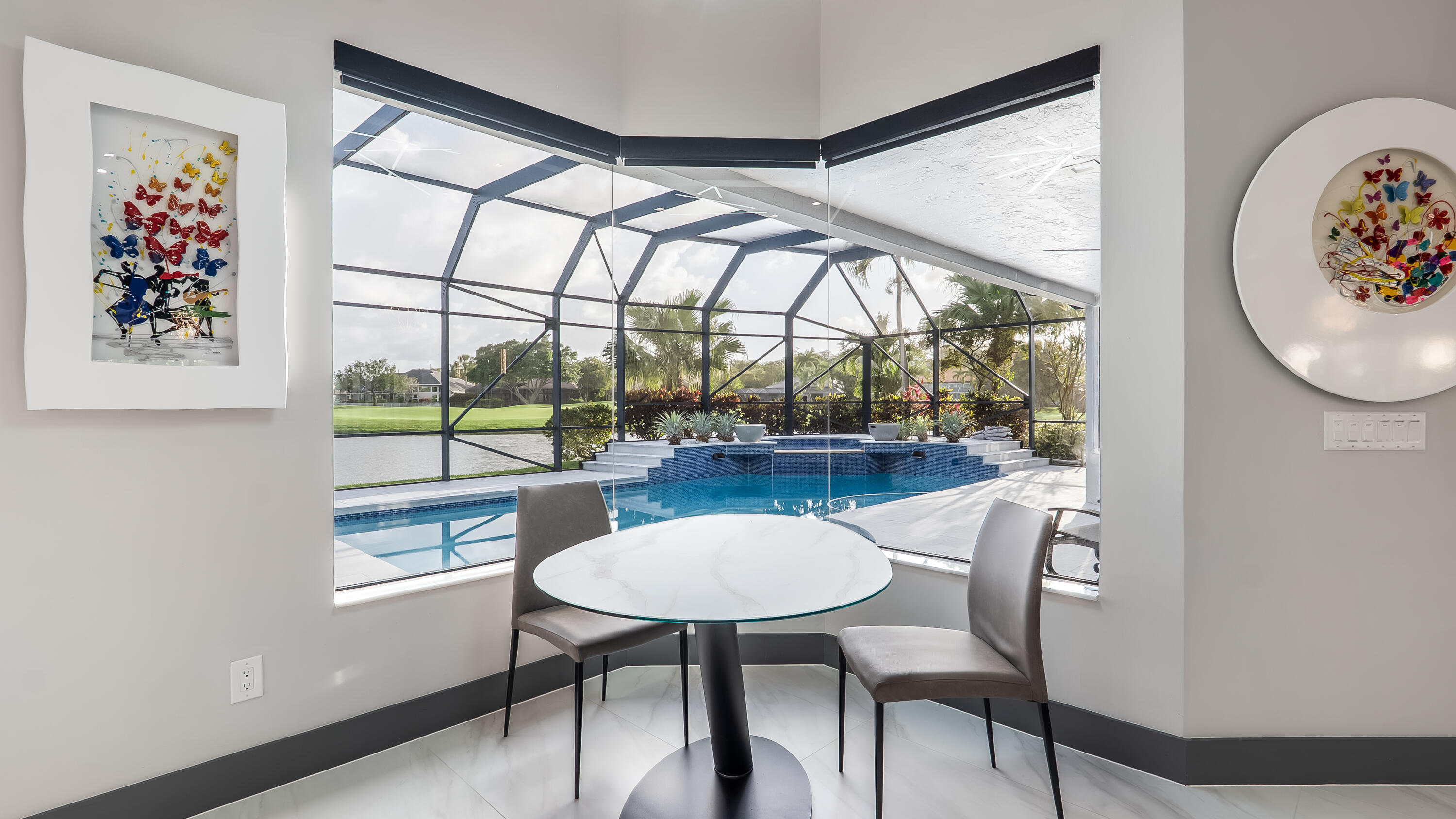 17683 Sealakes Drive Boca Raton, FL 33498 - Photo 55 of 61 a view of a dining room with furniture and a window