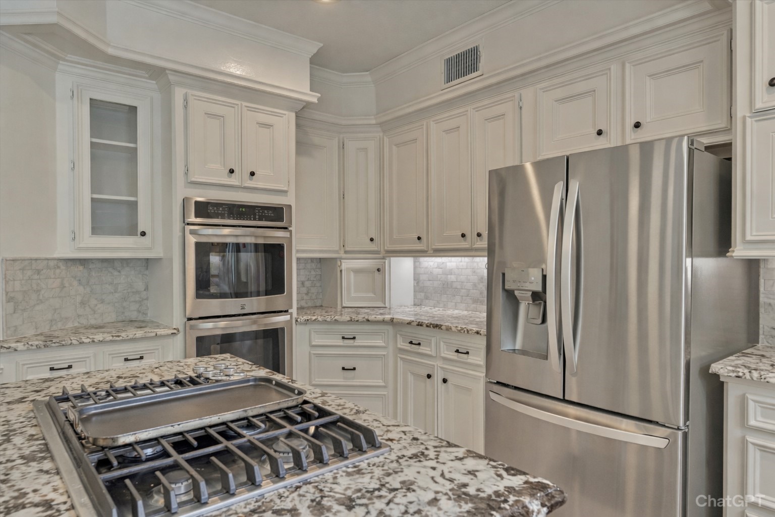91 Wind Ridge Circle Spring, TX 77381 - Photo 11 of 50 The chef of the family will love the double ovens, gas cooktop, and the abundance of cabinetry and prep space.