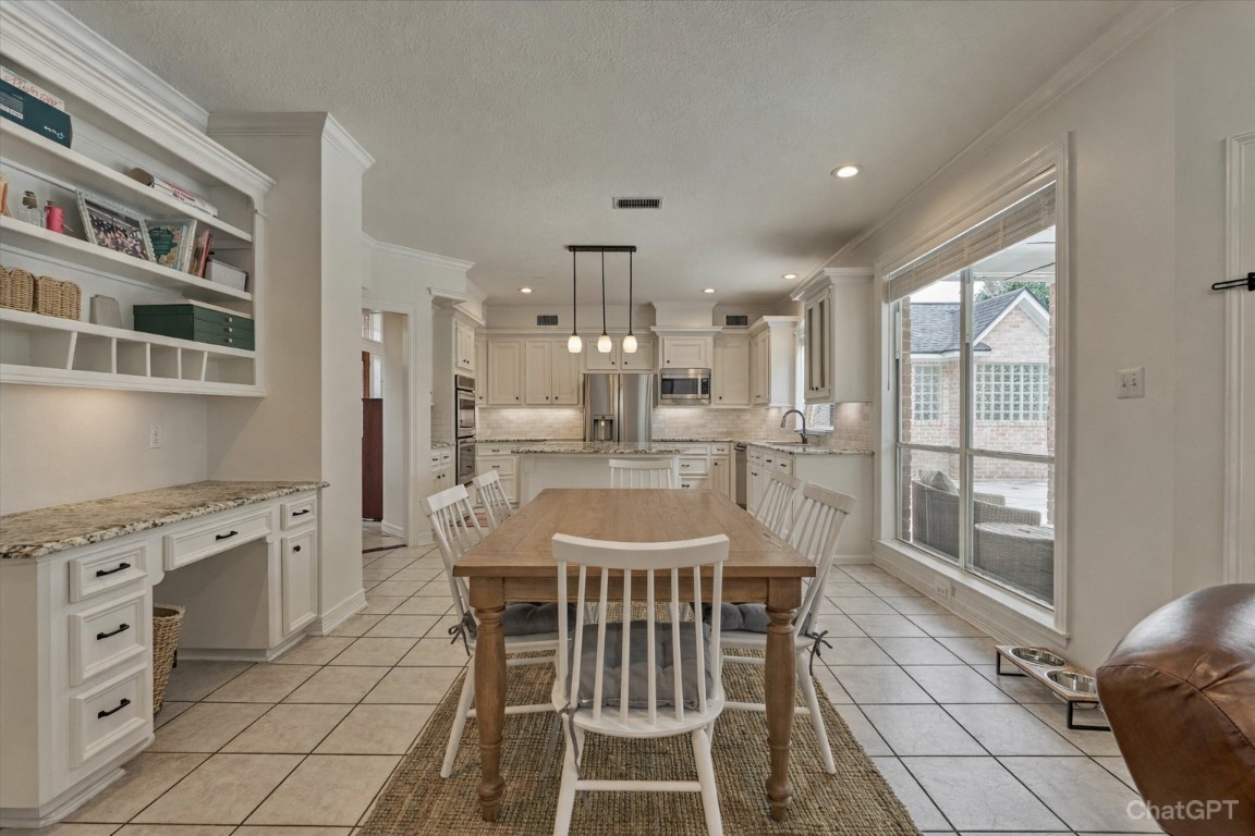 91 Wind Ridge Circle The Woodlands, TX 77381 - Photo 16 of 50 Breakfast room boasts a planning area with organizers!