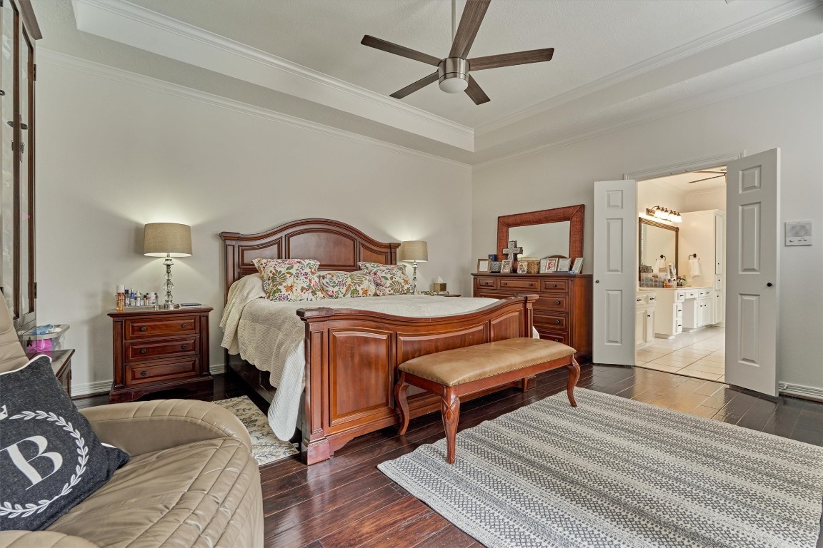 91 Wind Ridge Circle The Woodlands, TX 77381 - Photo 19 of 50 Private primary suite showcases space, a trayed ceiling, and luxe bathroom!