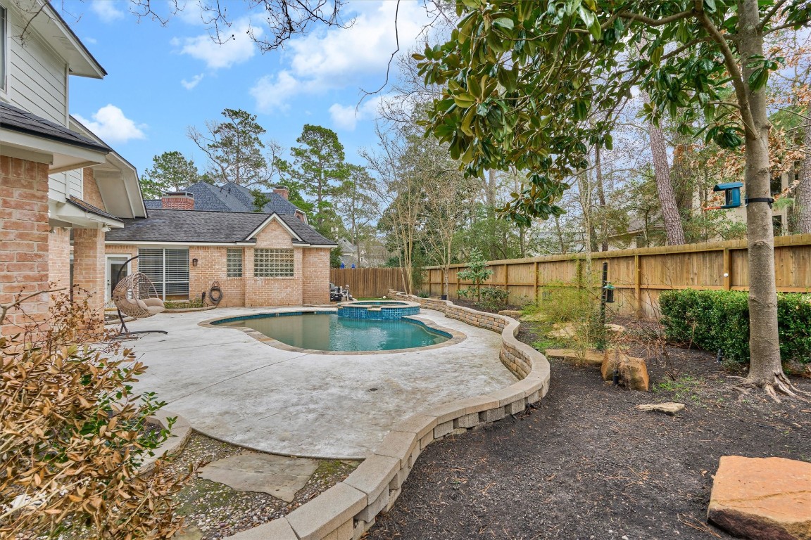 91 Wind Ridge Circle The Woodlands, TX 77381 - Photo 41 of 50 Note the beautiful magnolia tree!
