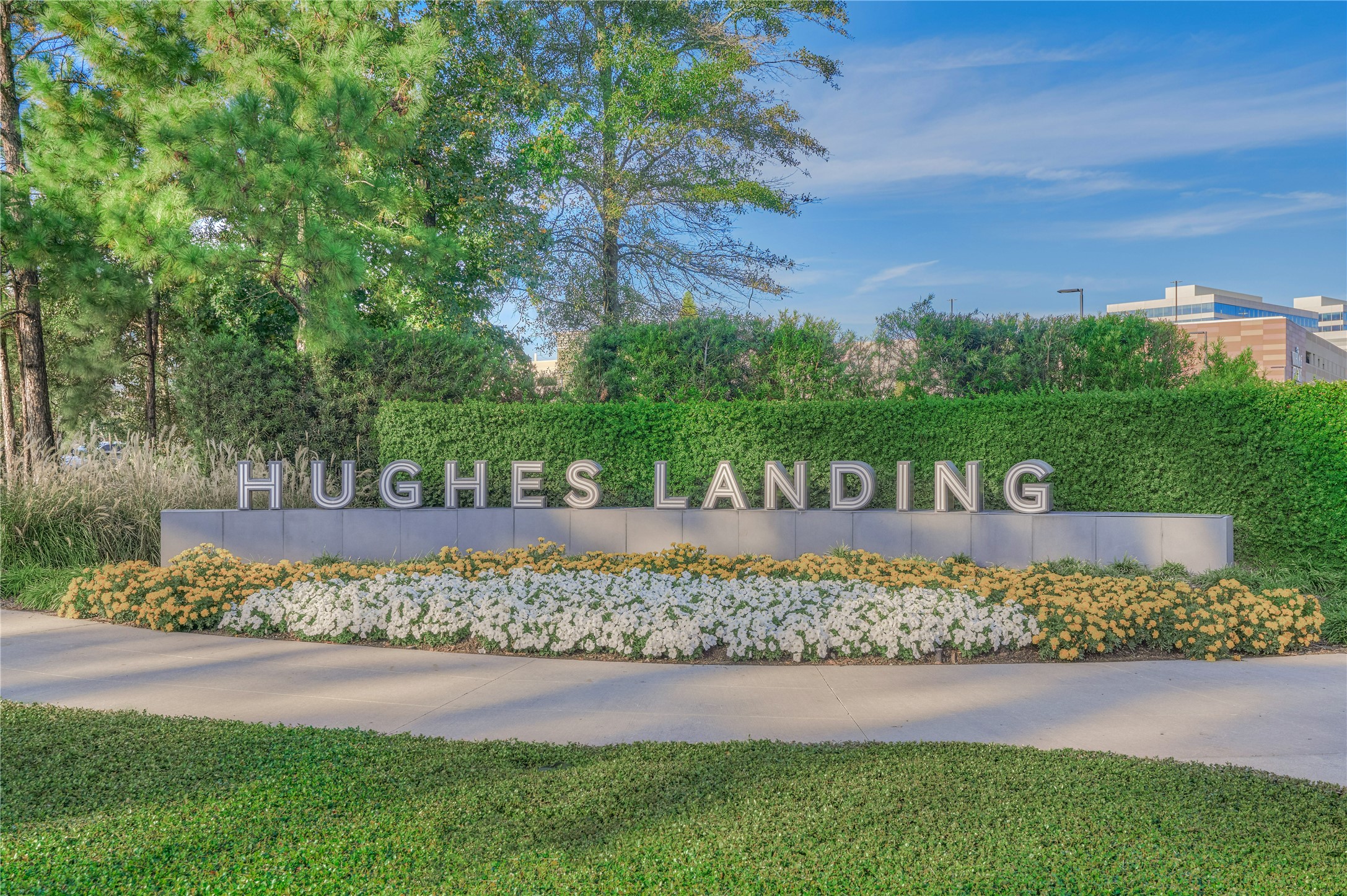 91 Wind Ridge Circle Spring, TX 77381 - Photo 45 of 50 Iconic Hughes Landing entrance — where waterfront living meets premier dining, shopping, and entertainment in the heart of The Woodlands.
