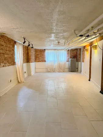 a view of a house with a garage