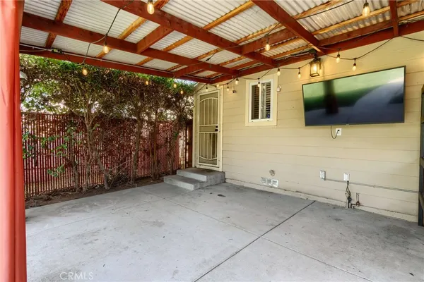 a view of a room with wooden walls