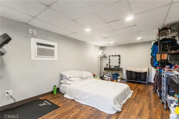 a bathroom with a sink a toilet and shower curtain