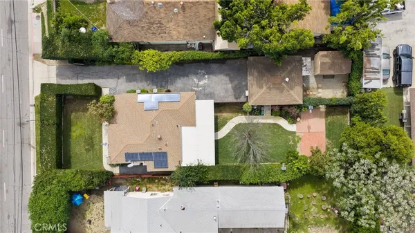 an aerial view of residential house with parking space