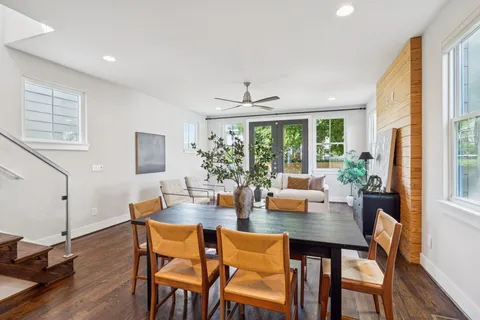a kitchen with a table and chairs in it