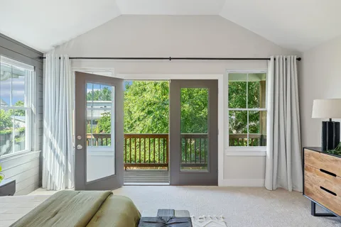 a view of a balcony with wooden floor