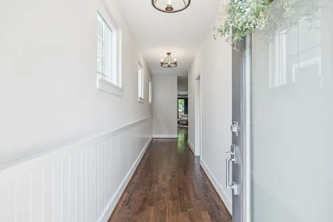 a view of a hallway with entryway