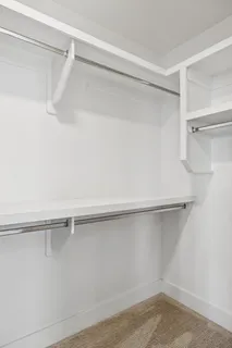 a view of a bedroom with closet area