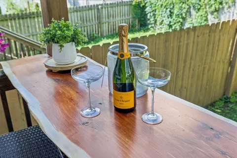 an aerial view of a house with outdoor space