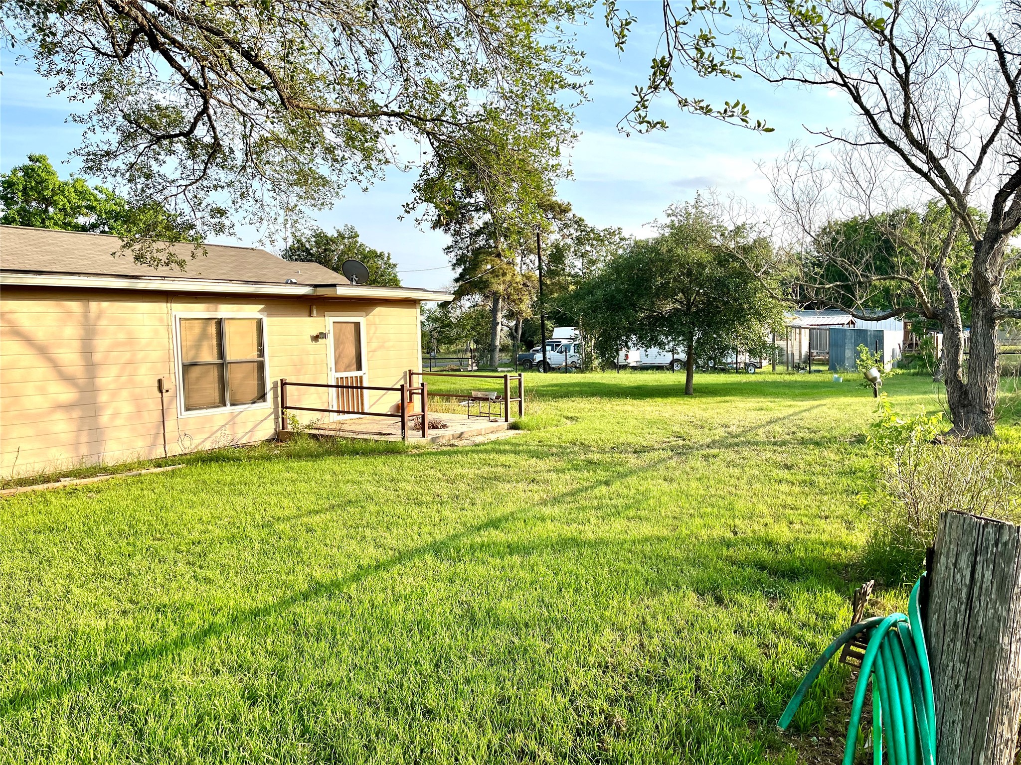 307 5th Street Sutherland Springs, TX 78161 - Photo 3 of 17 a view of a house with a yard and sitting area