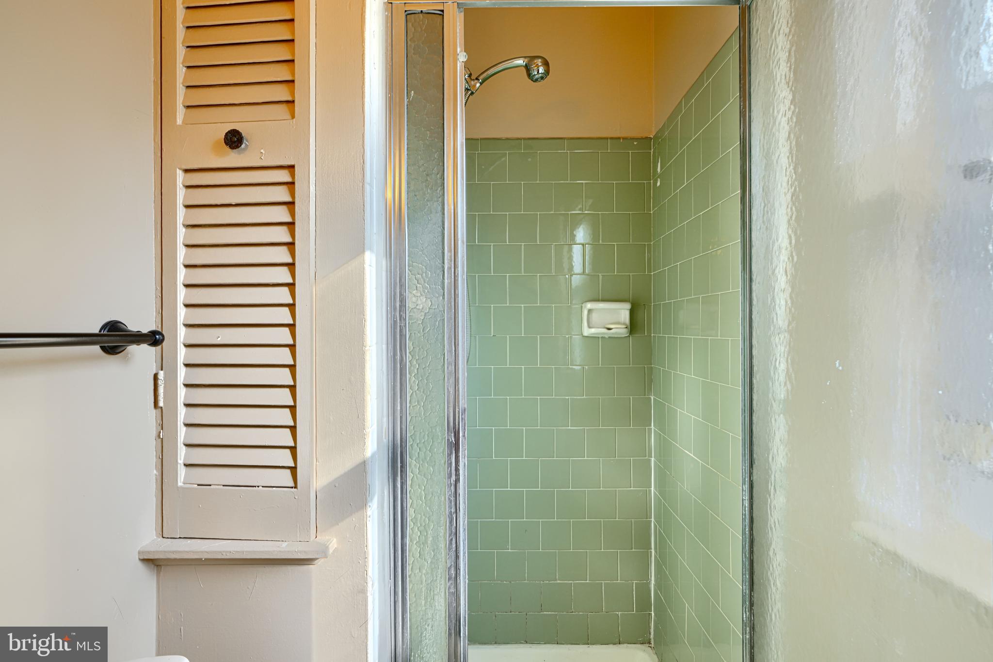 7209 Pinecrest Road Baltimore, MD 21228 - Photo 14 of 35 a bathroom with a shower