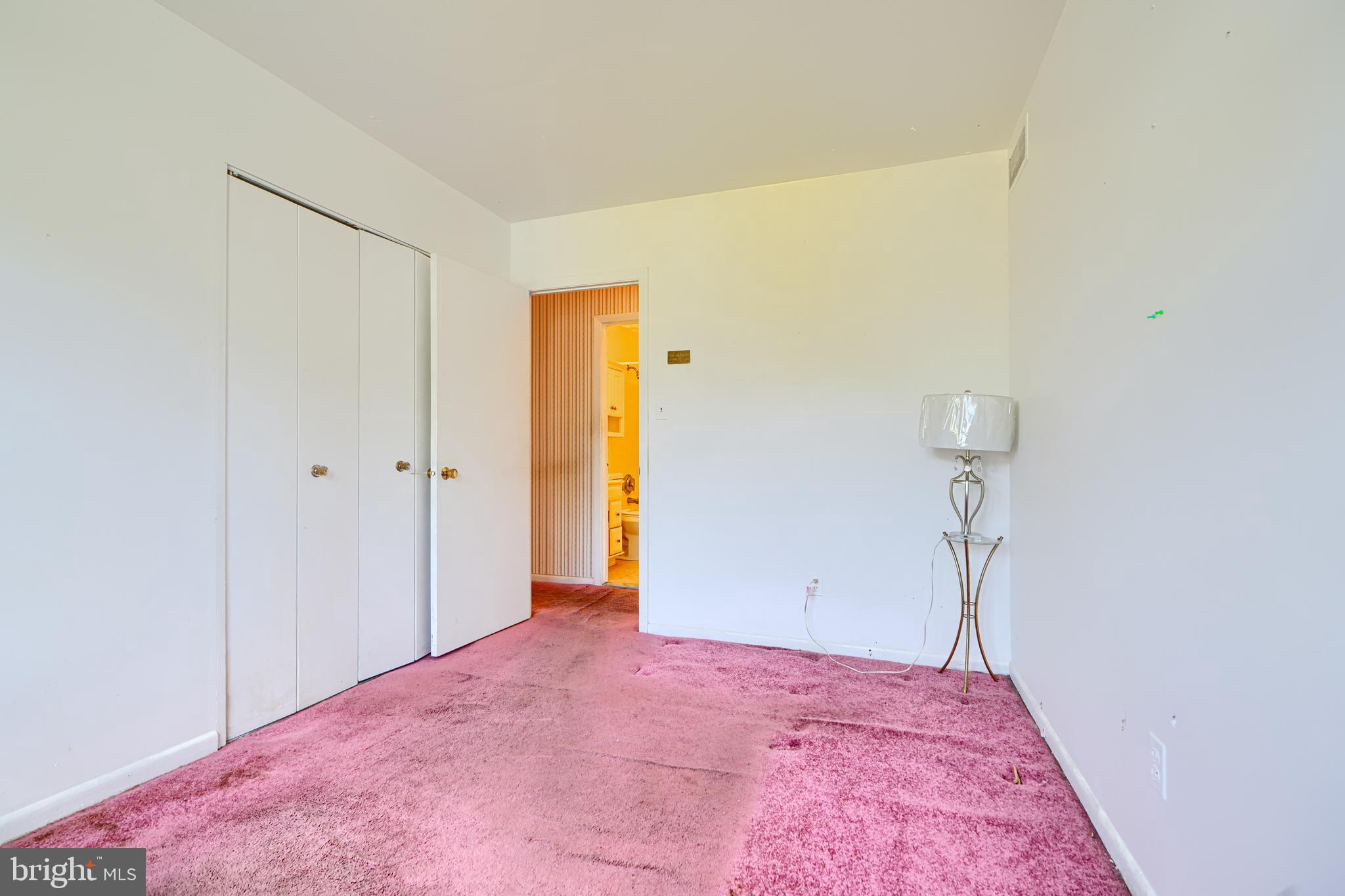 7209 Pinecrest Road Baltimore, MD 21228 - Photo 20 of 35 a view of a room with a wardrobe
