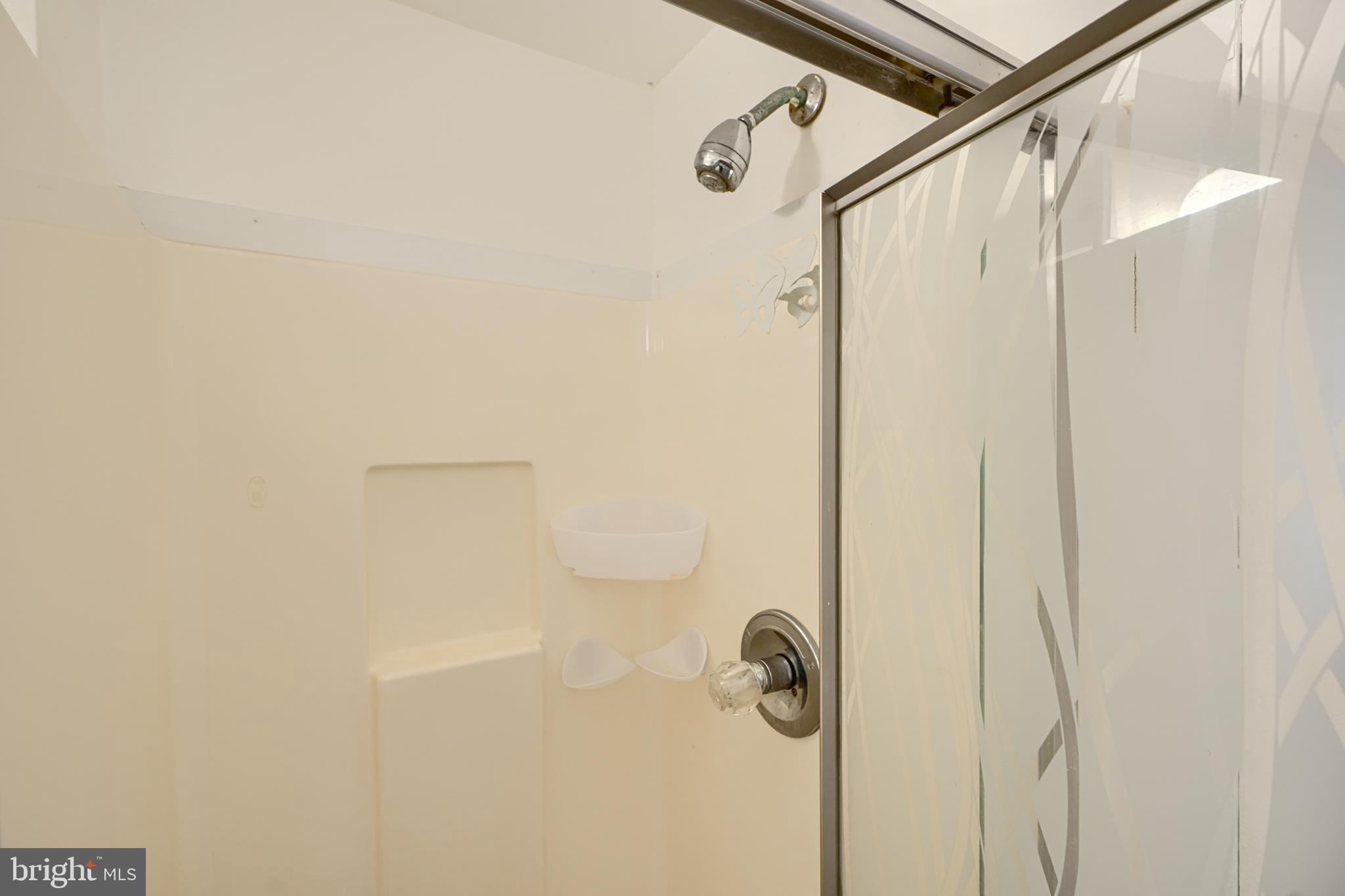 7209 Pinecrest Road Baltimore, MD 21228 - Photo 30 of 35 a bathroom with a shower