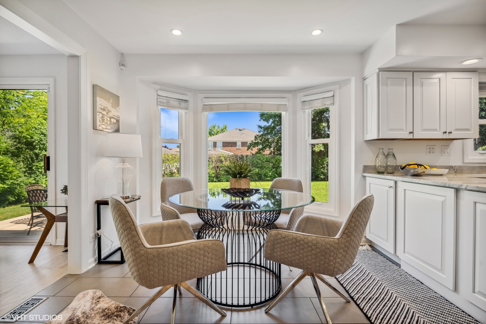 4130 Rutgers Lane Northbrook, IL 60062 - Photo 19 of 41 a view of a dining room with furniture window and outside view
