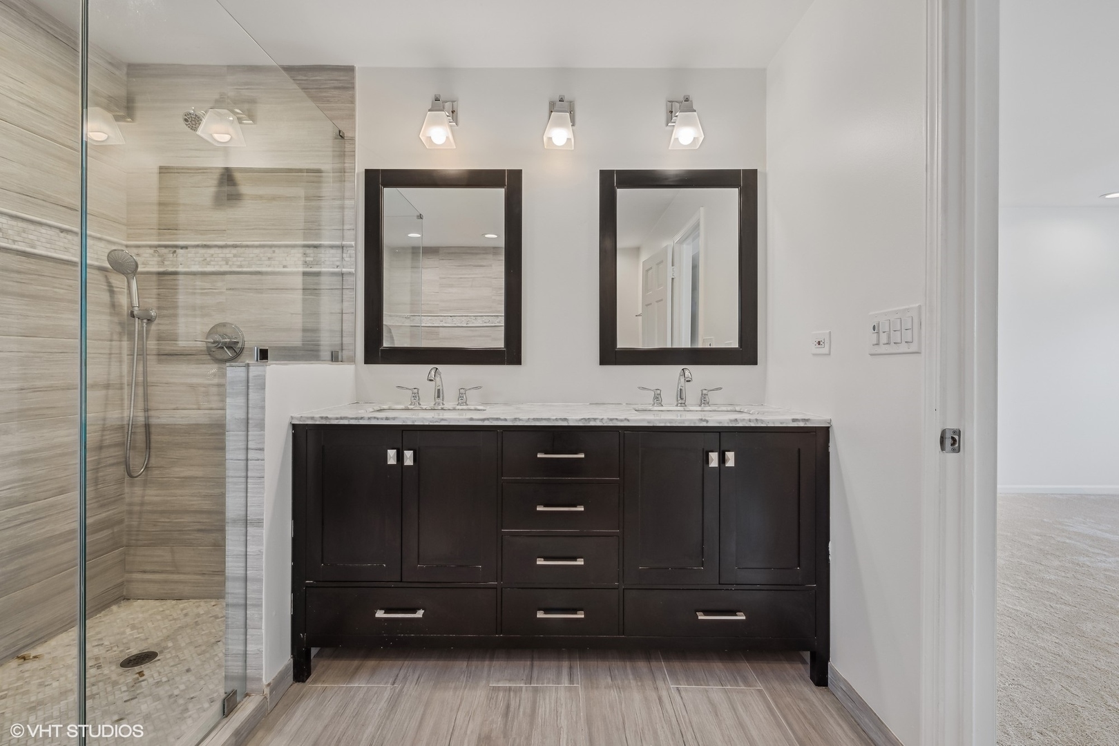 4130 Rutgers Lane Northbrook, IL 60062 - Photo 27 of 41 a bathroom with a double vanity sink and a mirror