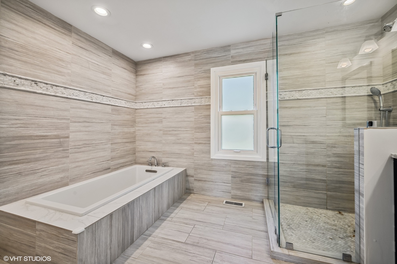 4130 Rutgers Lane Northbrook, IL 60062 - Photo 28 of 41 a bathroom with a bathtub and shower