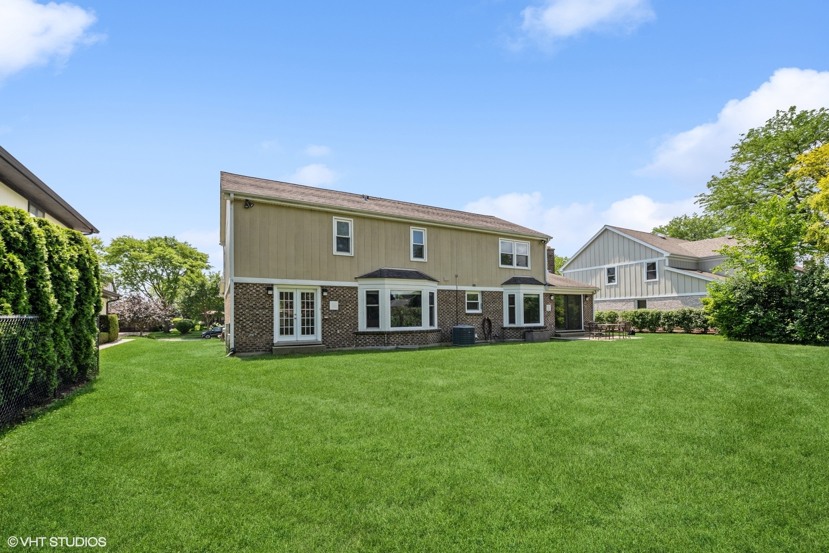 4130 Rutgers Lane Northbrook, IL 60062 - Photo 37 of 41 a view of a house with a big yard and large trees