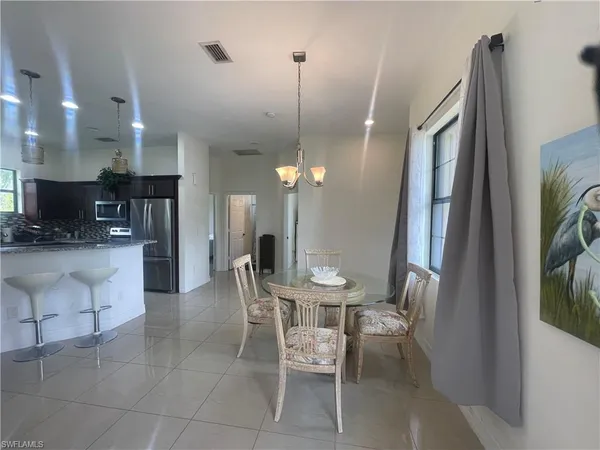 $585,000 | 2660 72nd Avenue Northeast, Naples, FL 34120