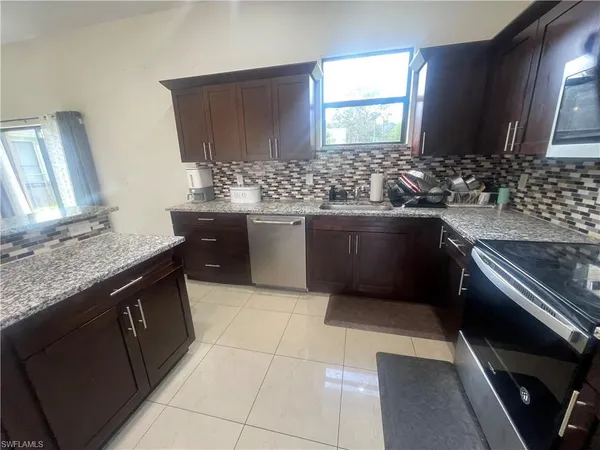 $585,000 | 2660 72nd Avenue Northeast, Naples, FL 34120