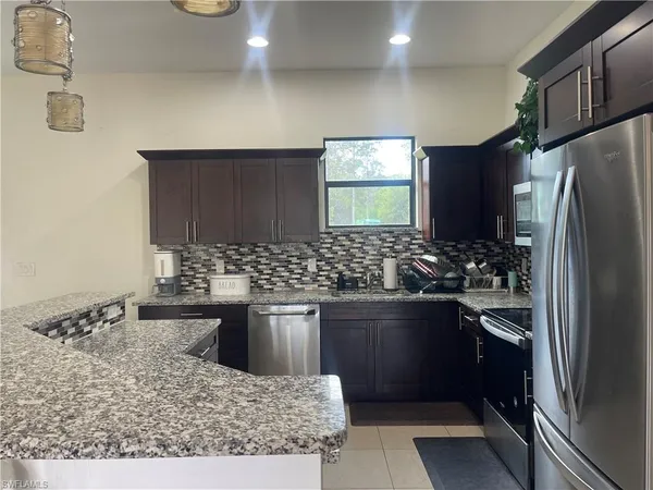 $585,000 | 2660 72nd Avenue Northeast, Naples, FL 34120