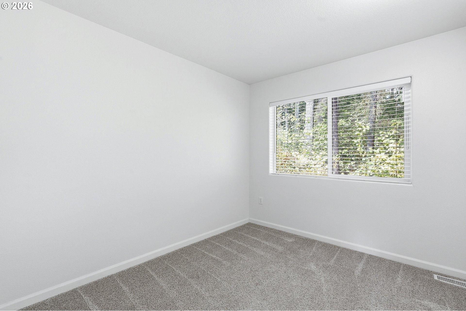 15430 Southwest Sparrow Loop, Unit 105 Beaverton, OR 97007 - Photo 32 of 43 Bedroom