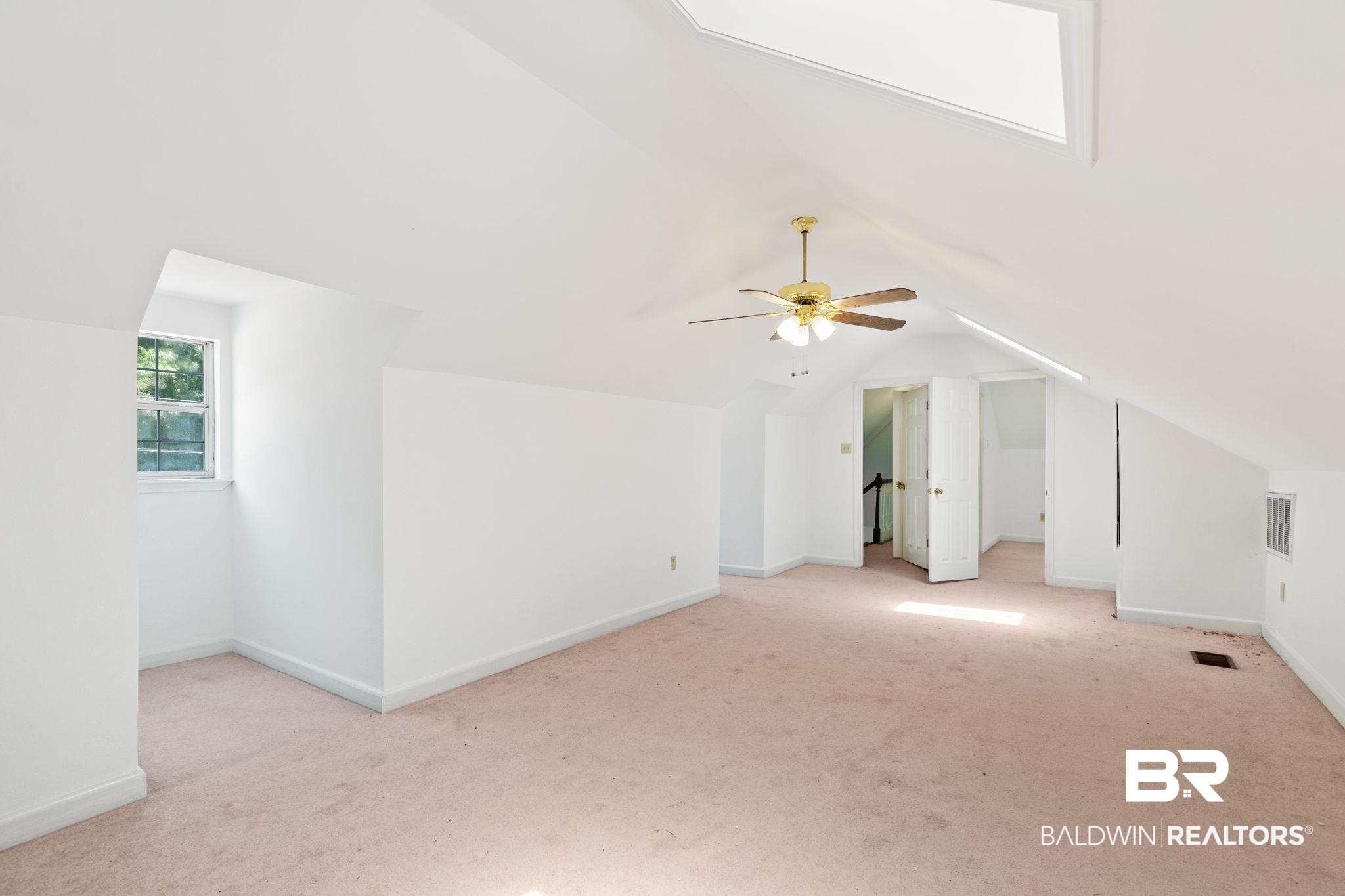 927 Cleveland Road Saraland, AL 36571 - Photo 48 of 80 Spacious bonus room featuring an angled ceiling, ceiling fan, and carpeted flooring