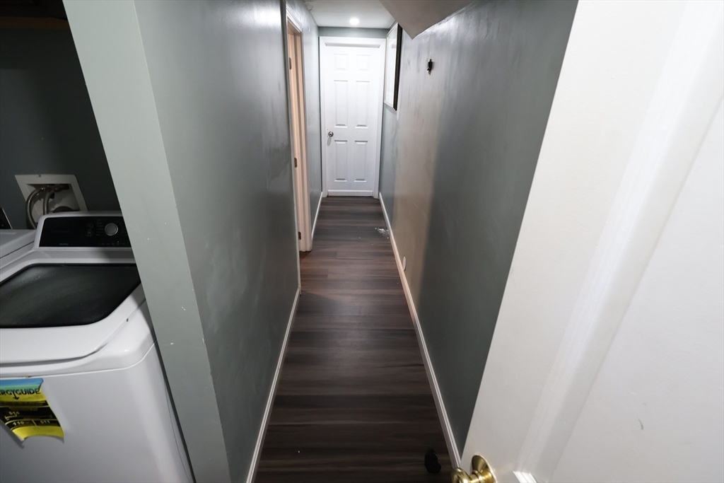 74 Sophia Drive Worcester, MA 01607 - Photo 11 of 15 a view of a hallway with wooden floor and entryway