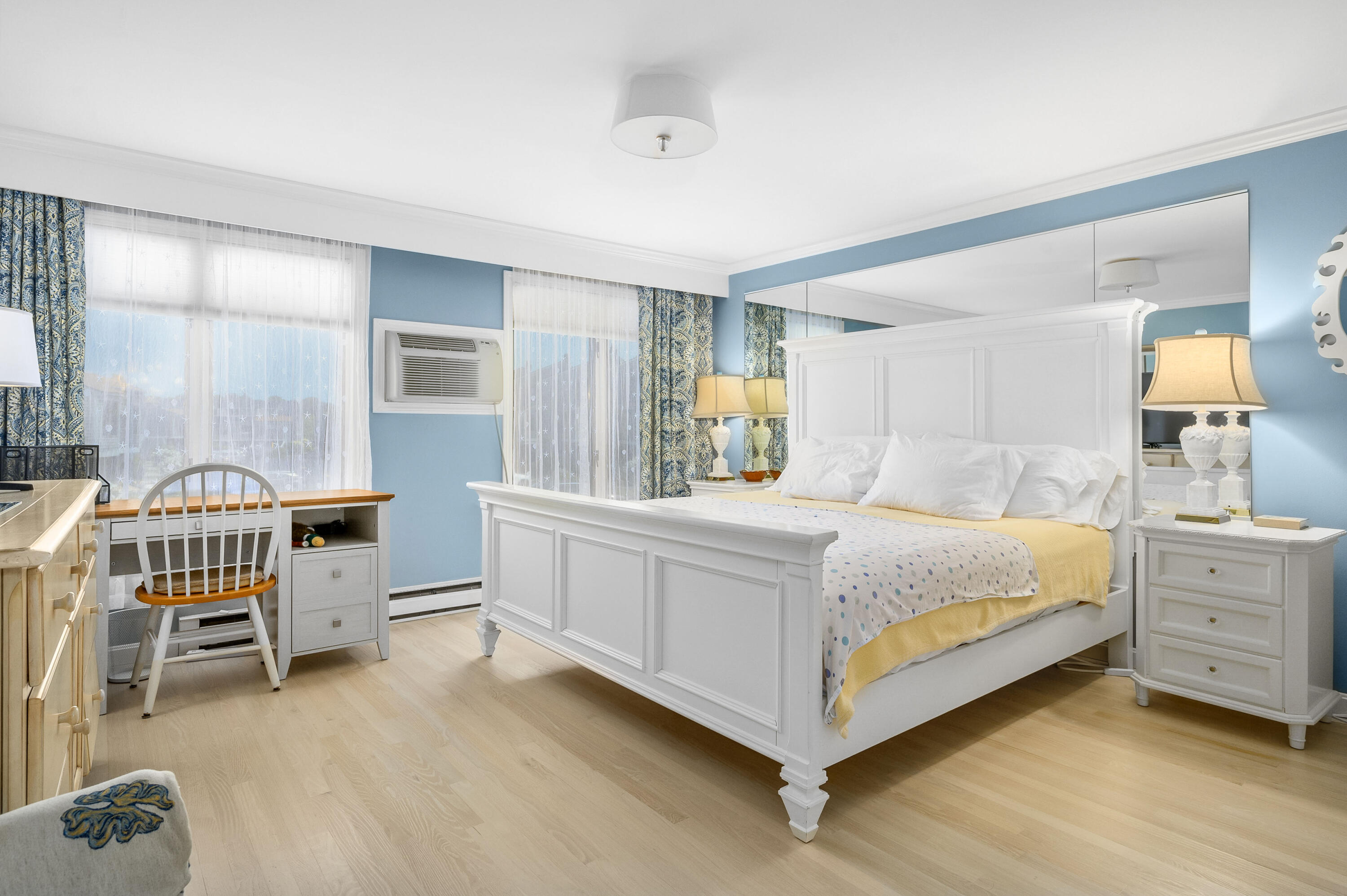 500 Ocean Street, Unit 68 Hyannis, MA 02601 - Photo 15 of 39 a spacious bedroom with a bed and a cabinets