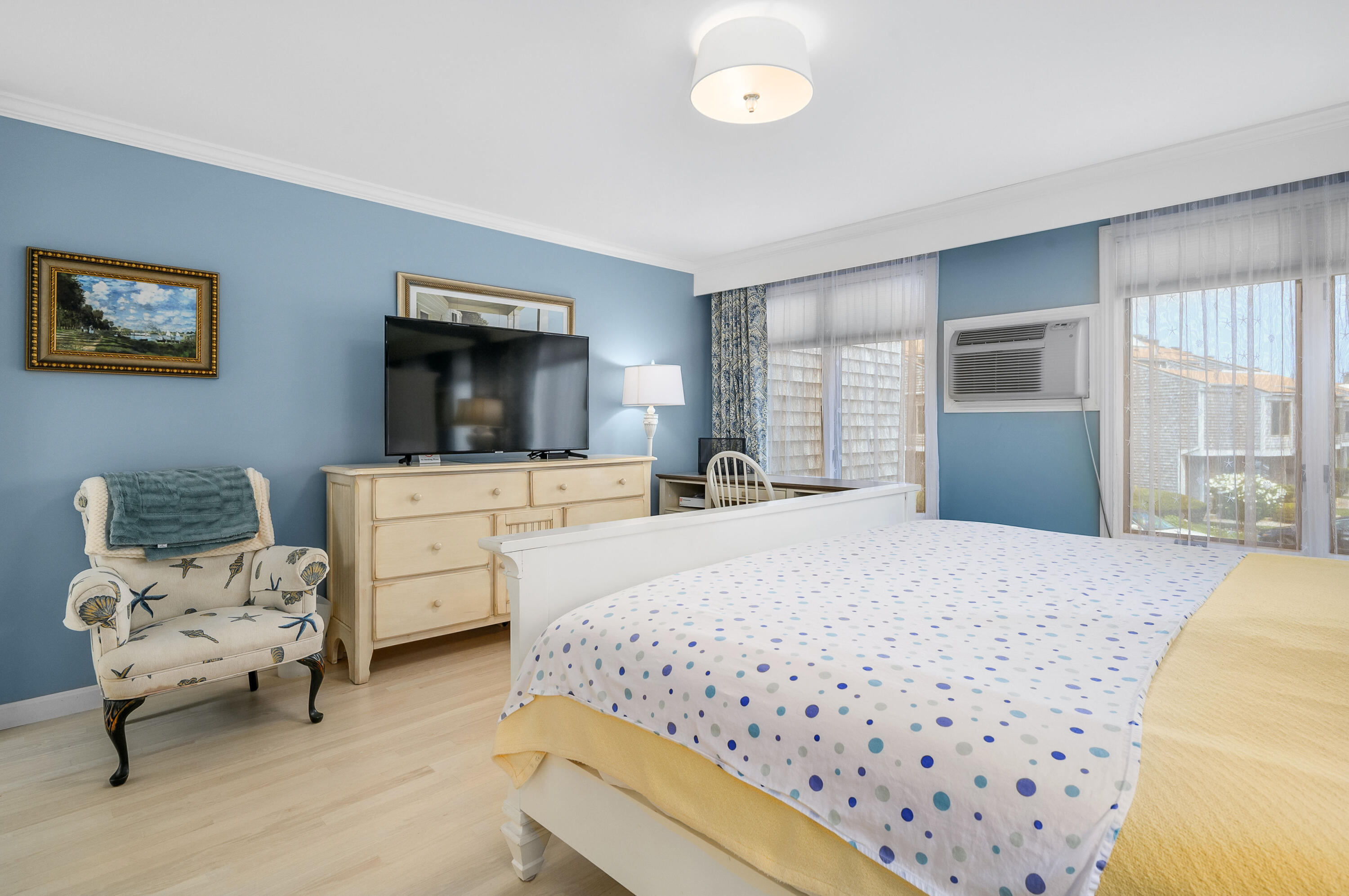 500 Ocean Street, Unit 68 Hyannis, MA 02601 - Photo 17 of 39 a bedroom with bed and window