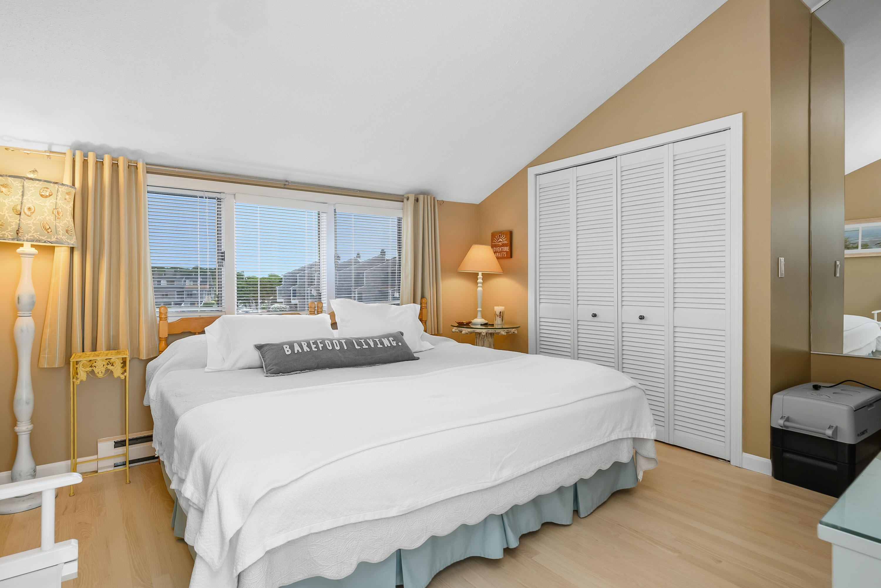 500 Ocean Street, Unit 68 Hyannis, MA 02601 - Photo 20 of 39 a bedroom with a bed and a window