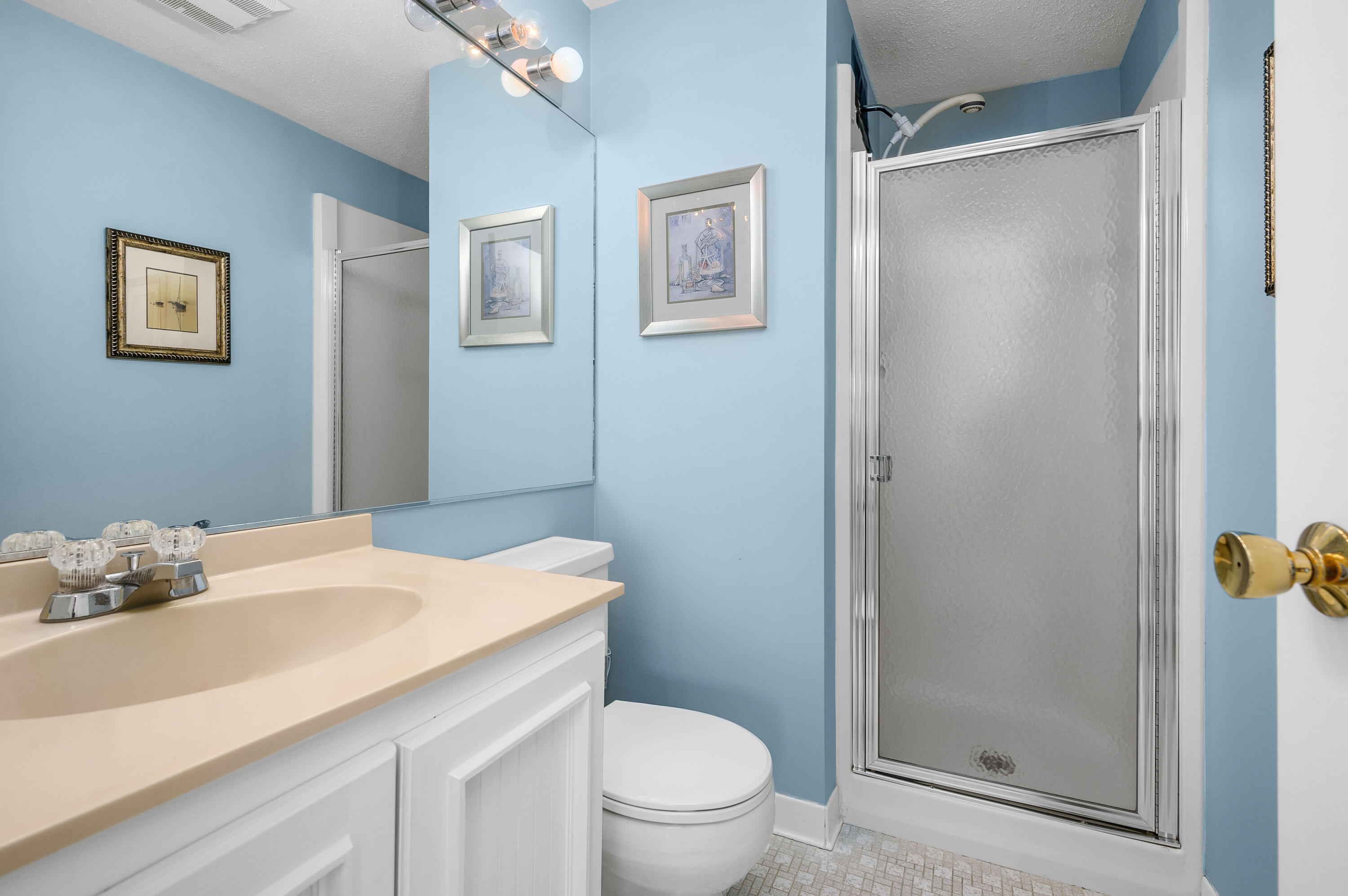 500 Ocean Street, Unit 68 Hyannis, MA 02601 - Photo 22 of 39 a bathroom with a sink toilet and vanity