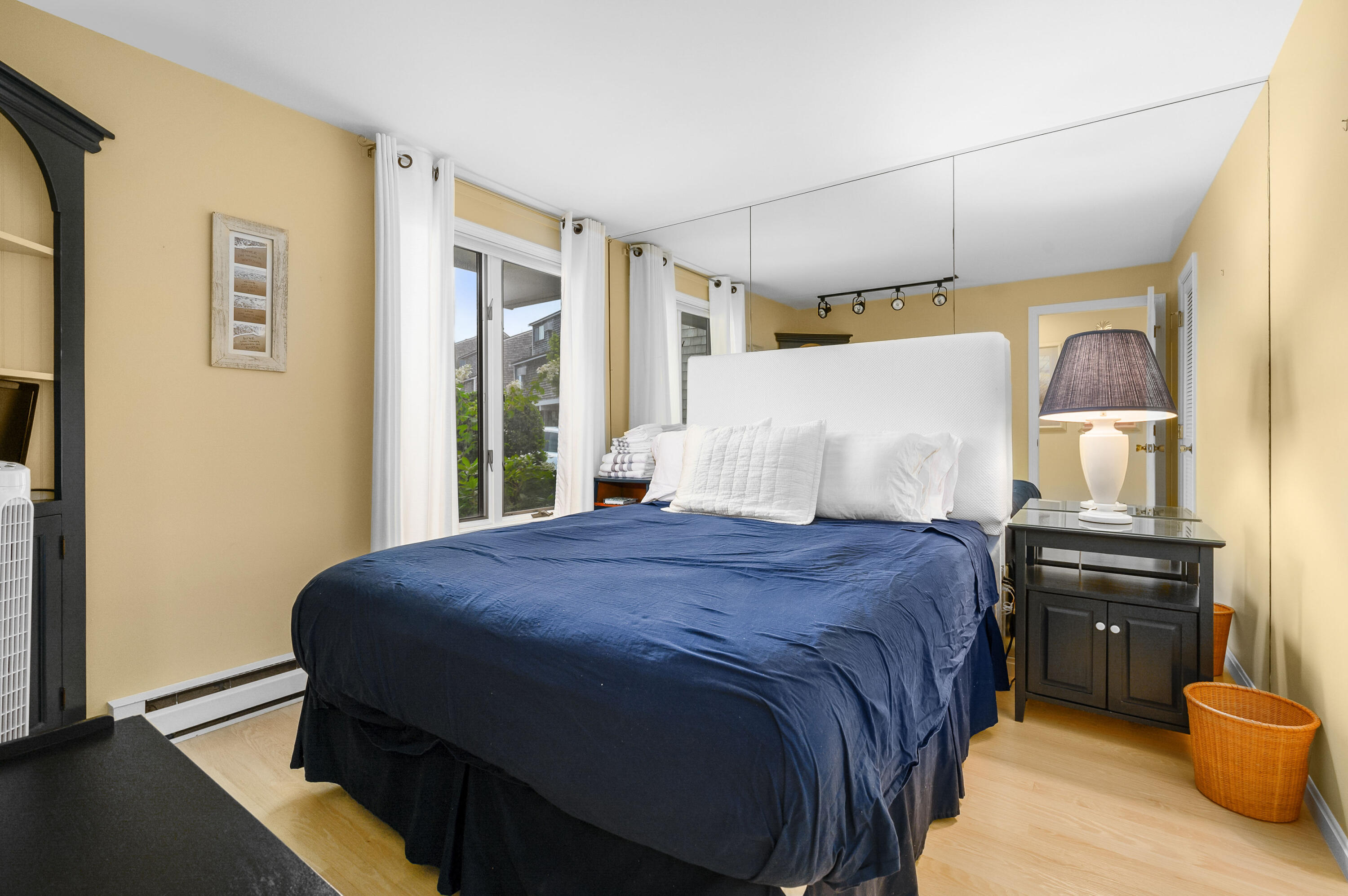 500 Ocean Street, Unit 68 Hyannis, MA 02601 - Photo 3 of 39 a bedroom with a bed and a closet