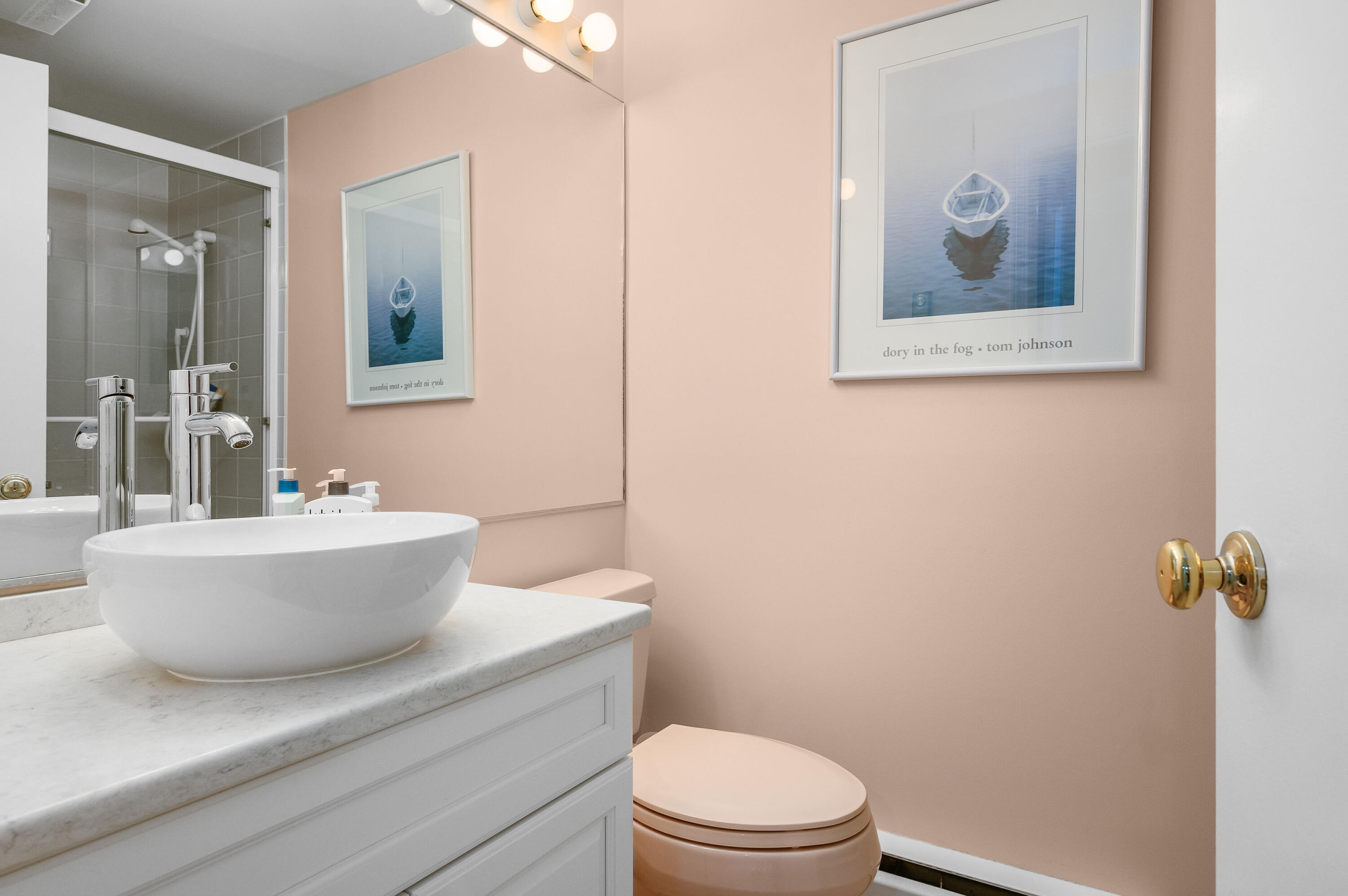 500 Ocean Street, Unit 68 Hyannis, MA 02601 - Photo 4 of 39 a white toilet sitting next to a bathroom sink and tub