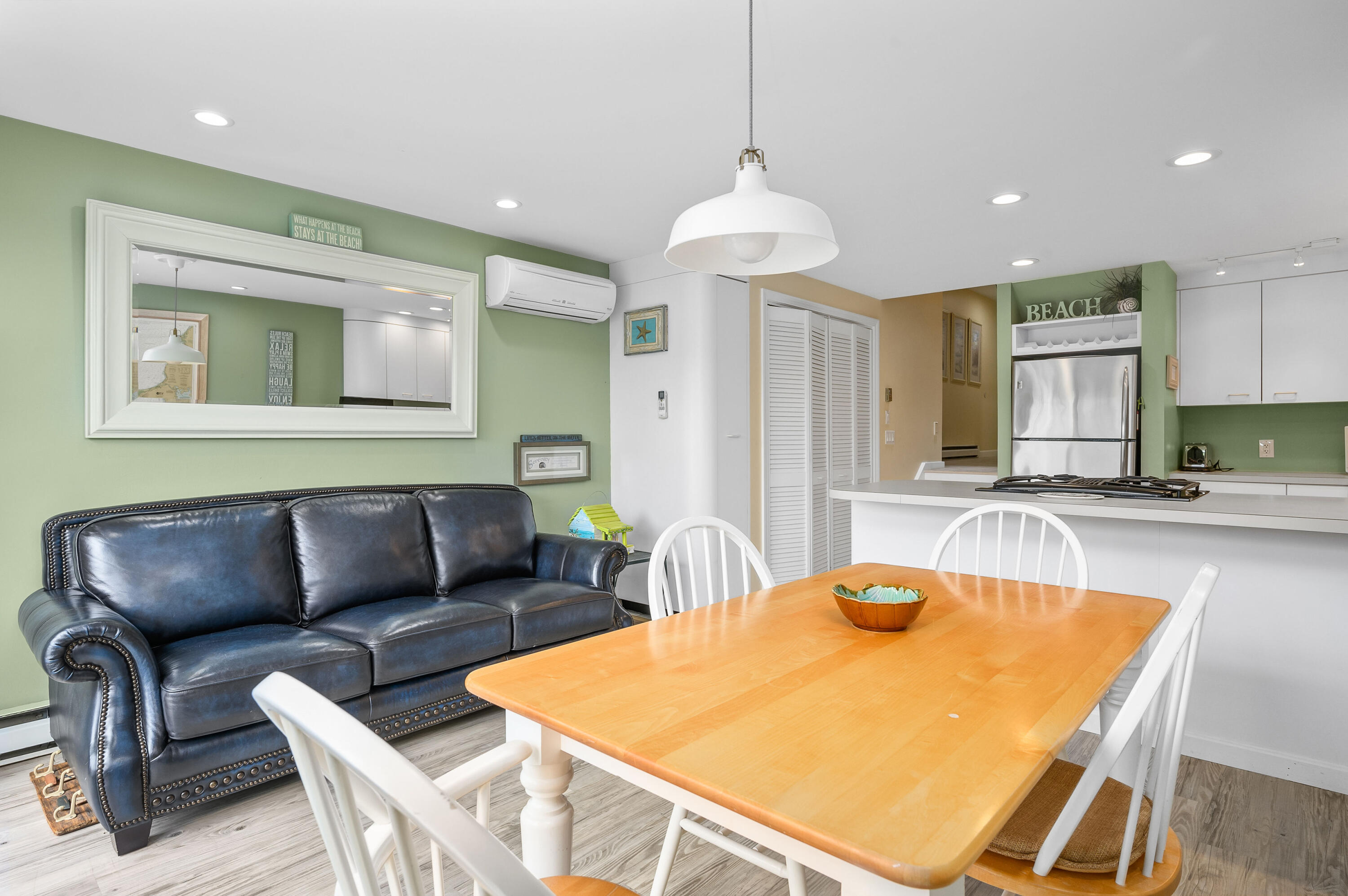 500 Ocean Street, Unit 68 Hyannis, MA 02601 - Photo 7 of 39 a living room with furniture a couch and a chandelier