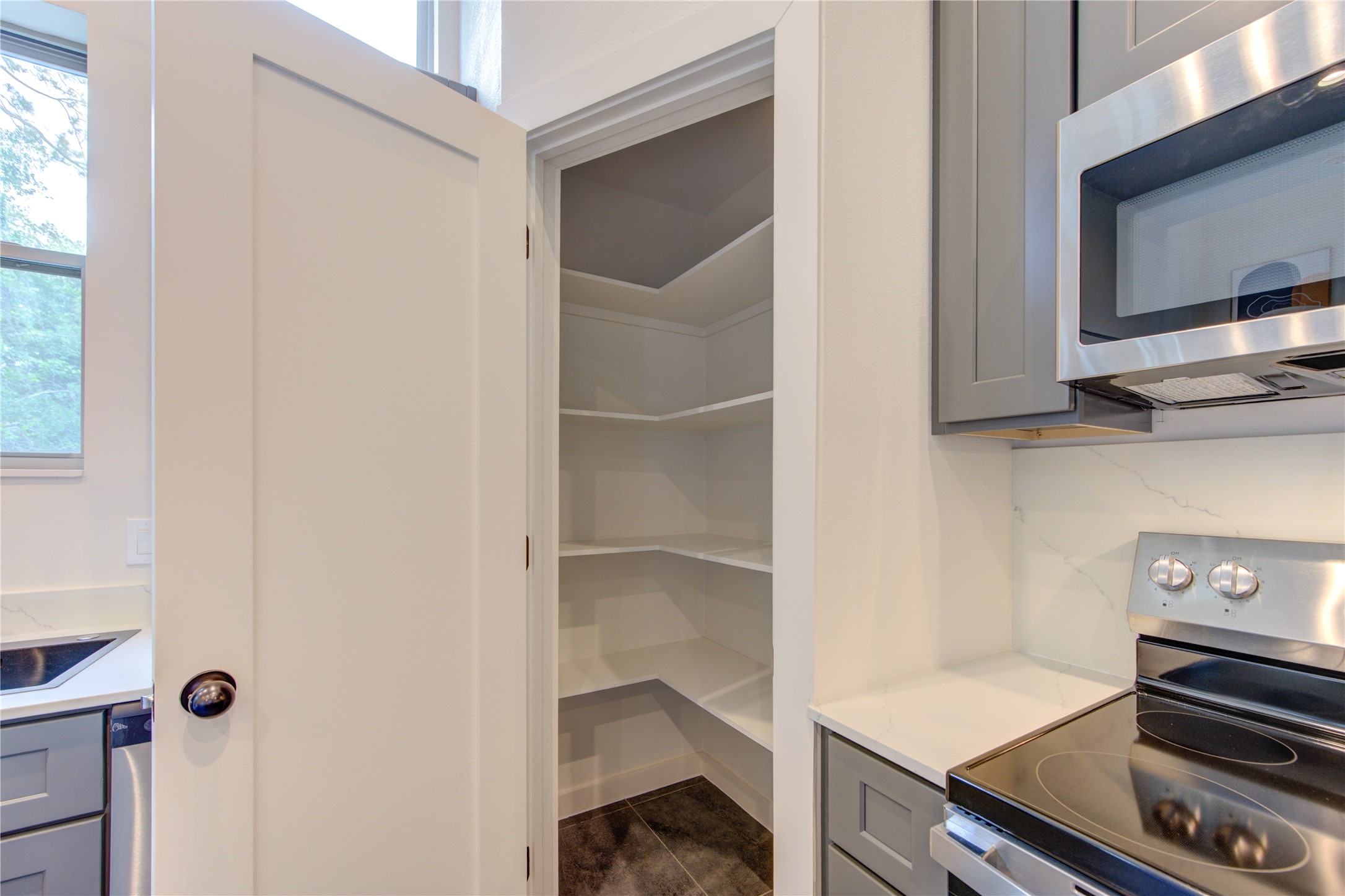 13115 Wild Orchid Lane Cypress, TX 77429 - Photo 14 of 48 a kitchen with appliances and cabinets