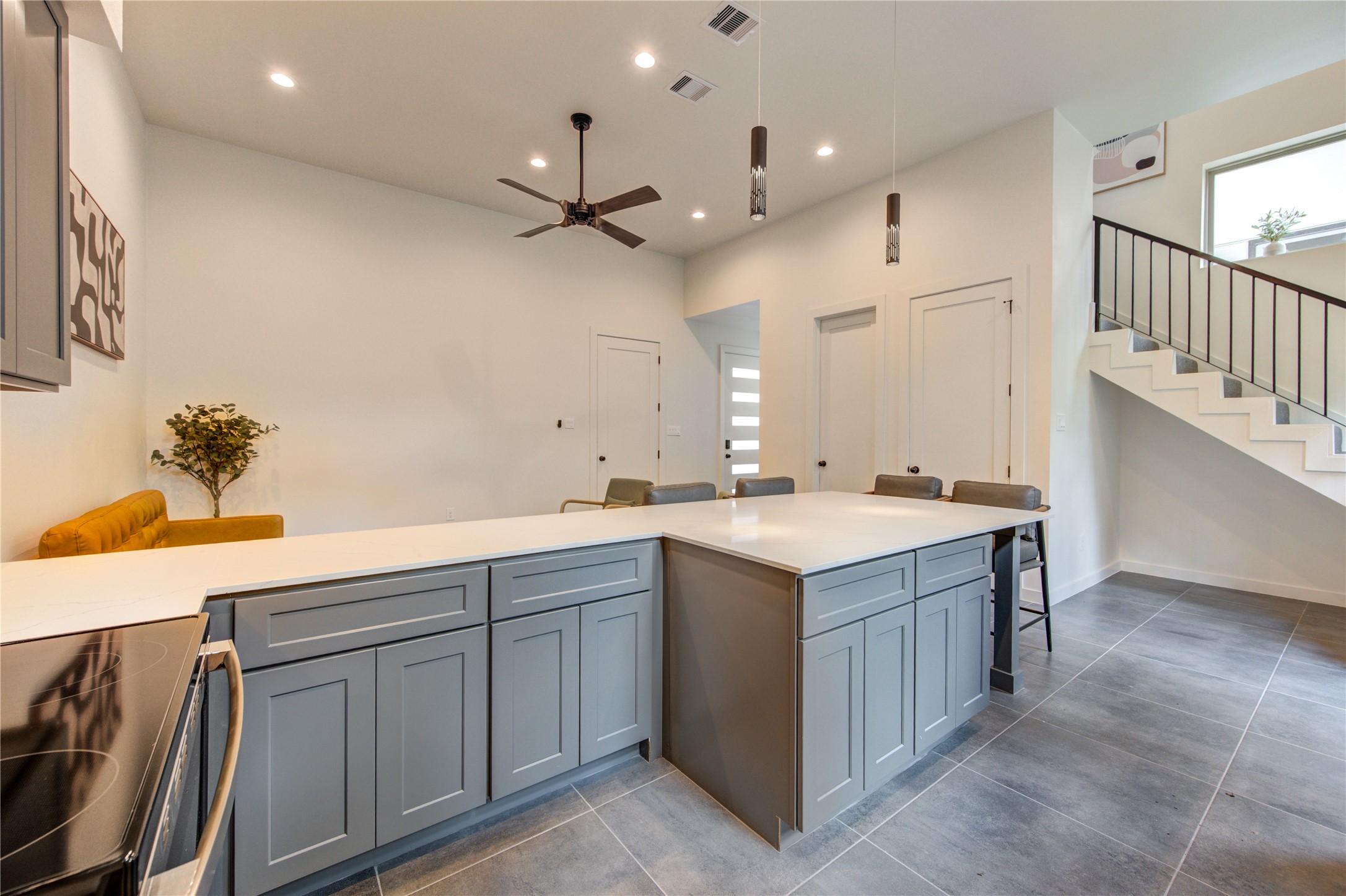 13115 Wild Orchid Lane Cypress, TX 77429 - Photo 15 of 48 a view of a kitchen with a sink and wooden floor