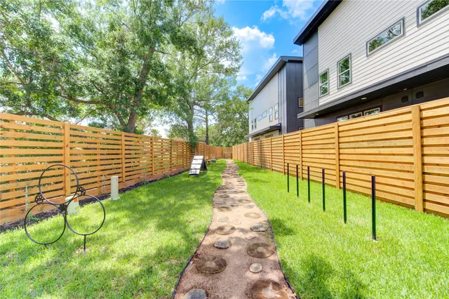 a view of a backyard with a slide