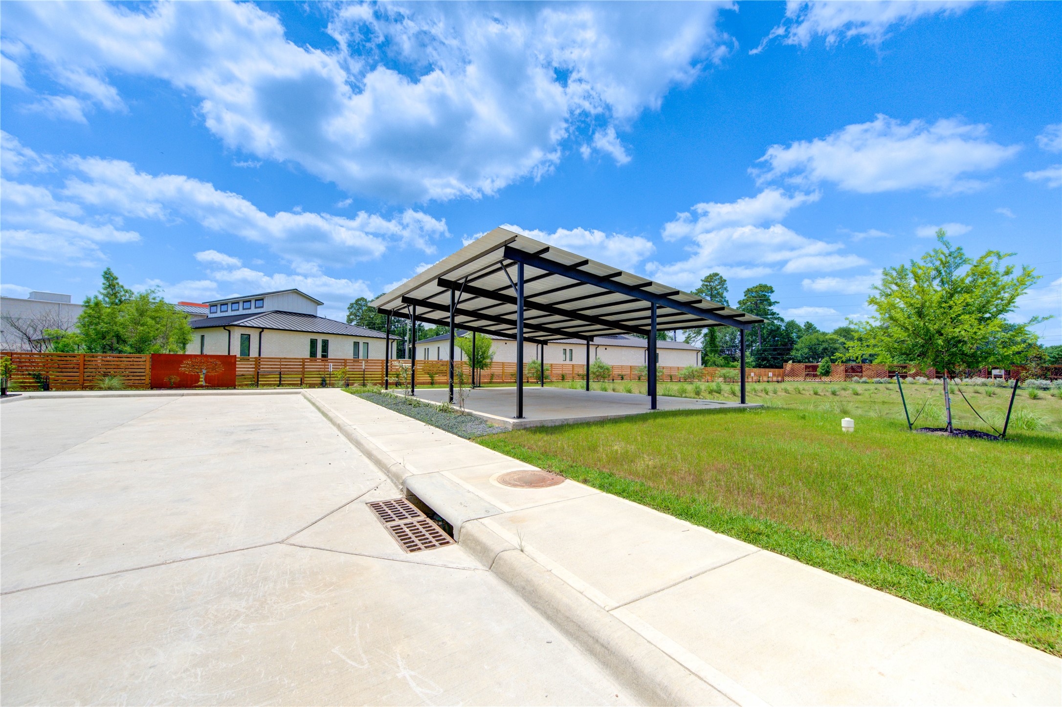 13115 Wild Orchid Lane Cypress, TX 77429 - Photo 46 of 48 a view of a swimming pool with a garden