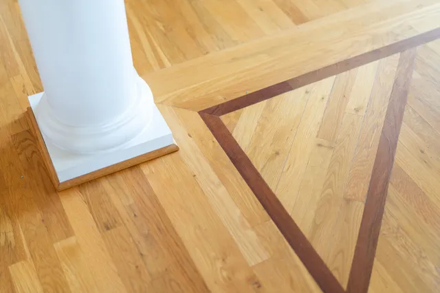 a view of balcony with wooden floor